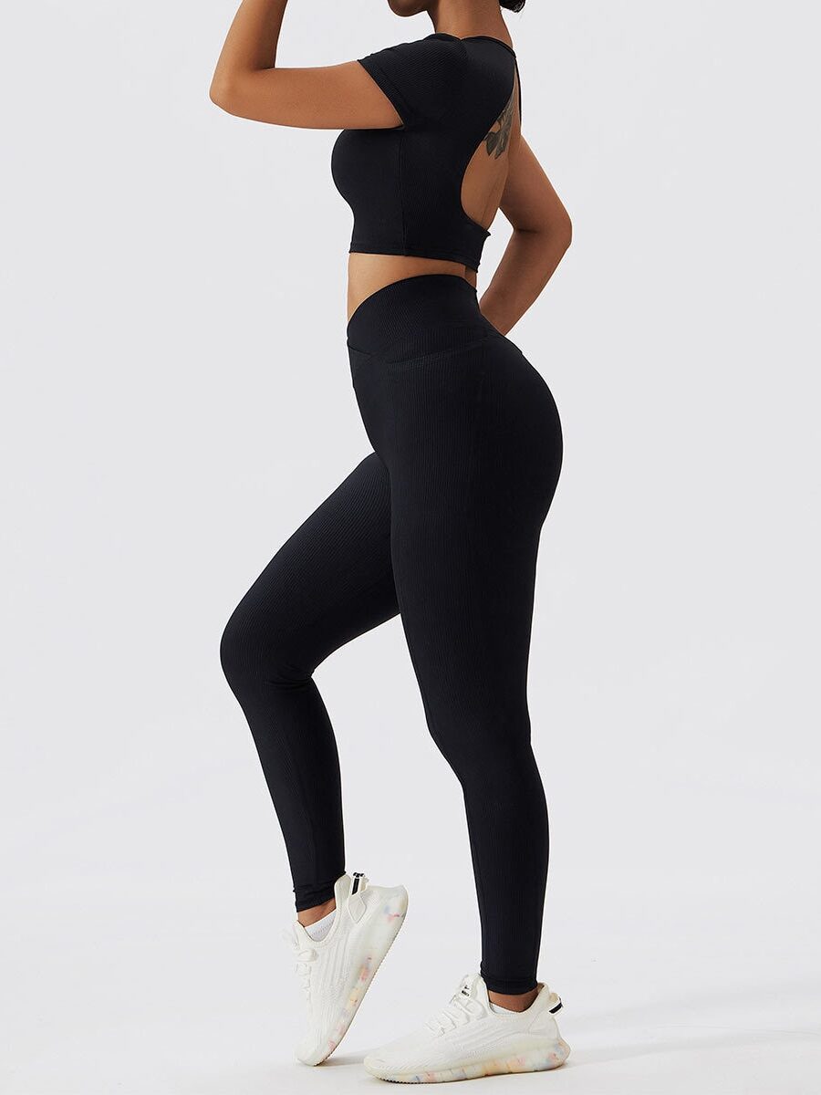 Chic Open-Back Ribbed Short-Sleeve Crop Top and High-Rise Pocket Leggings Set