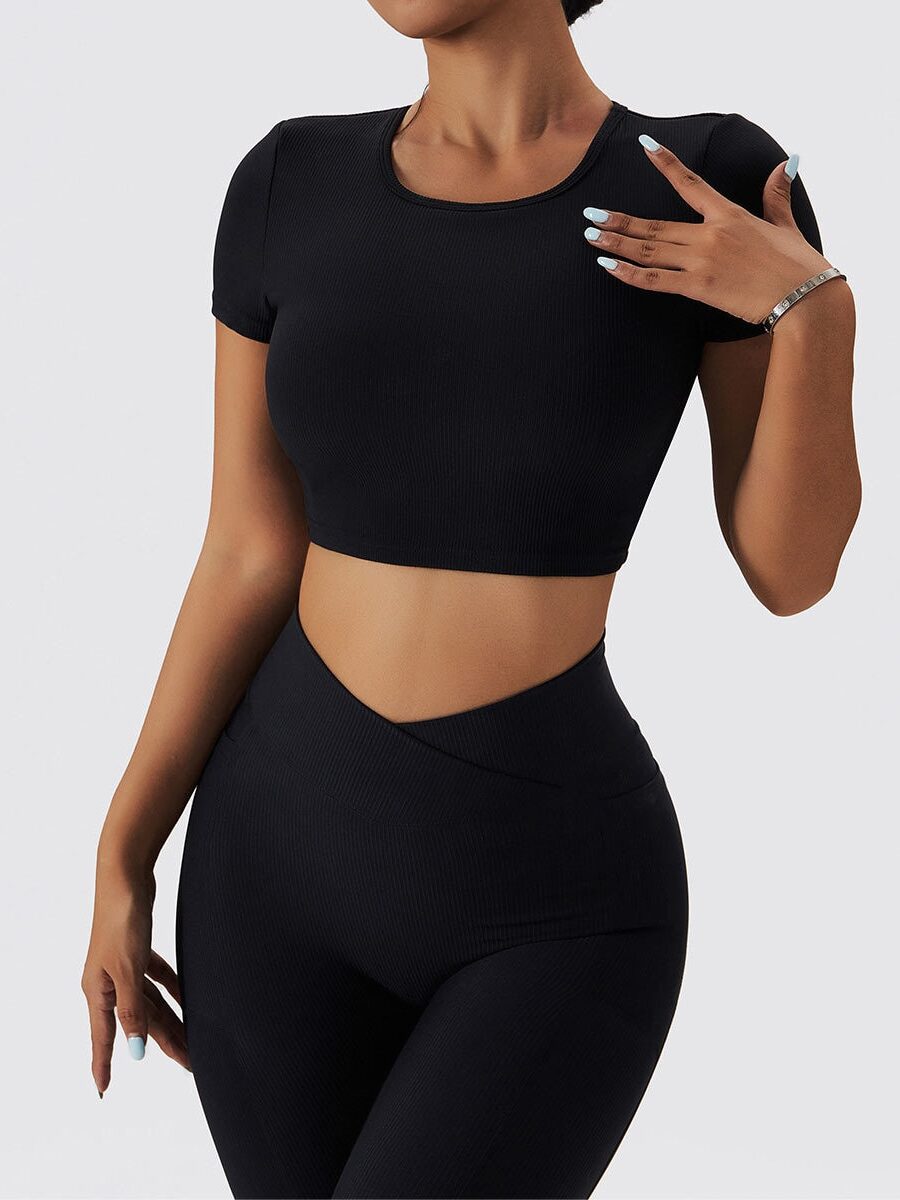 Flaunt Your Figure in This Sexy Ribbed Crop Top & High-Waisted Pocket Leggings Set - Open-Back, Short-Sleeve Design