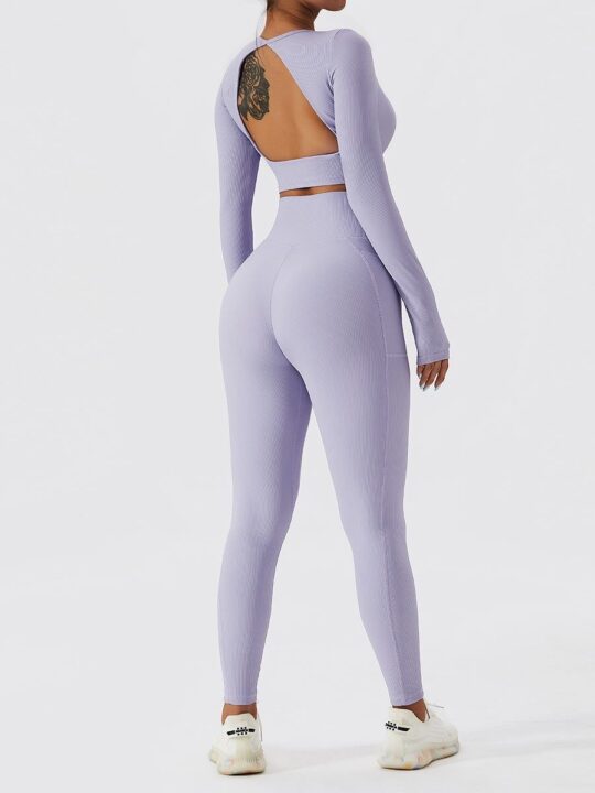 Stay On-Trend with this Stylish Open-Back Ribbed Long-Sleeve Crop Top & High-Waist Pocket Leggings Set - Perfect for Any Occasion!