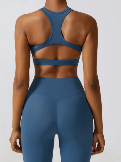 Speed Ahead with the Cut-Out Racerback Push-Up Sports Bra - For Maximum Performance!