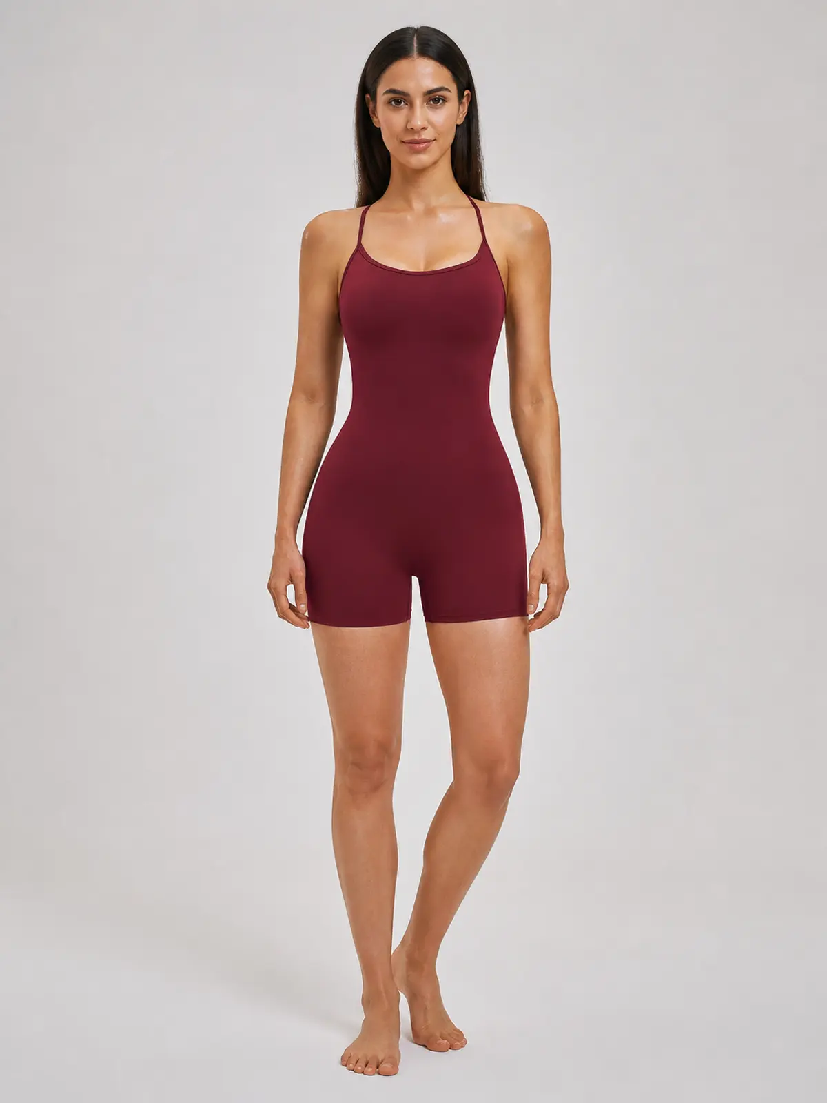 Arden Interval Sleeveless Cross-Back Yoga Romper — burgundy — unitard — authoritative variation image