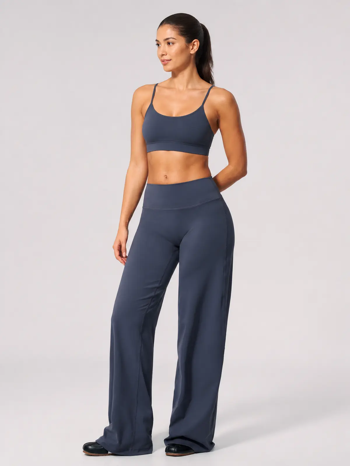 Asterine Passage High-Rise Flare Yoga Pants — dark slate blue — authoritative variation match