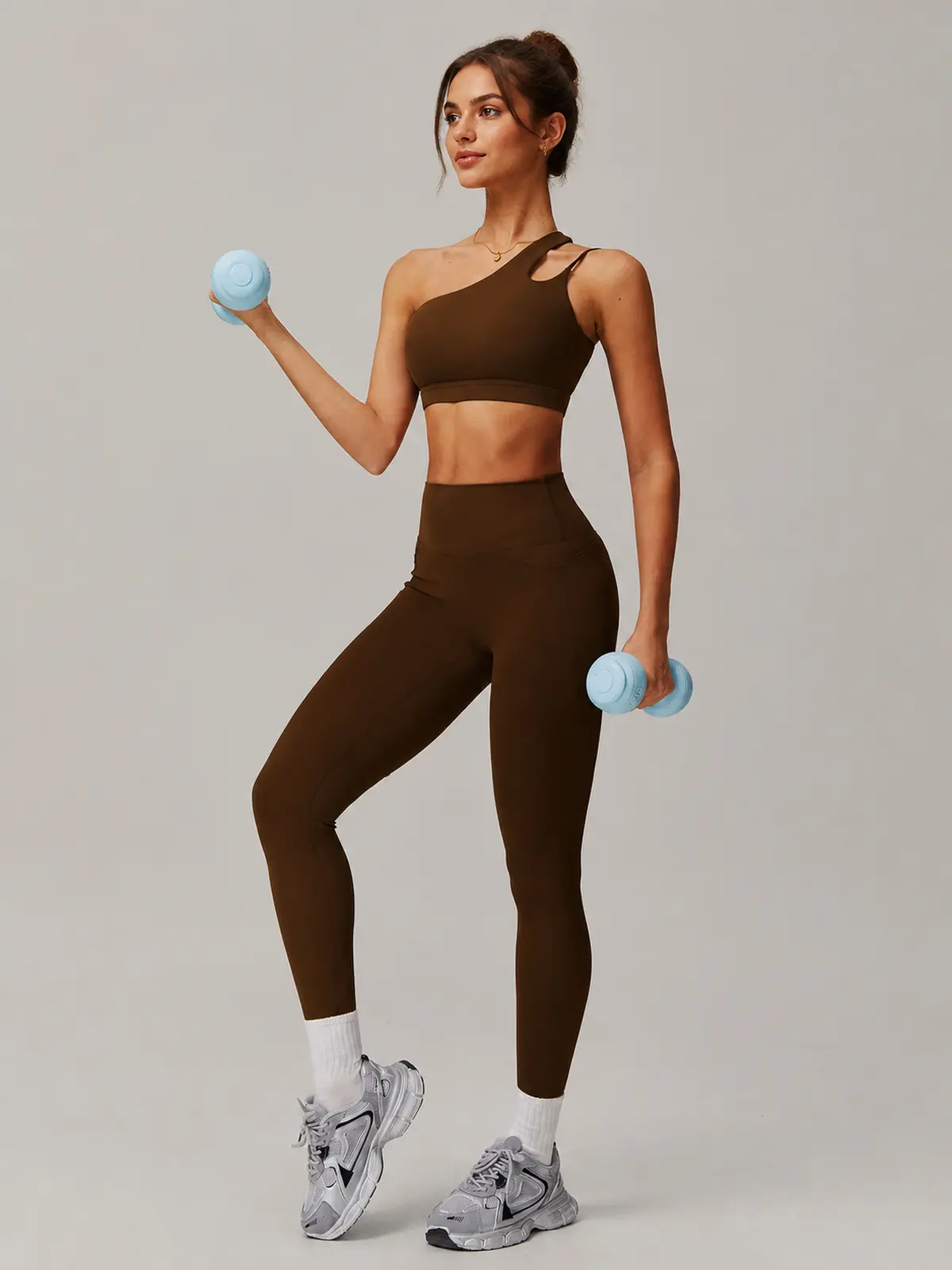 Asymmetry Edit One-Shoulder Cutout Sports Bra — brown — general — authoritative variation match