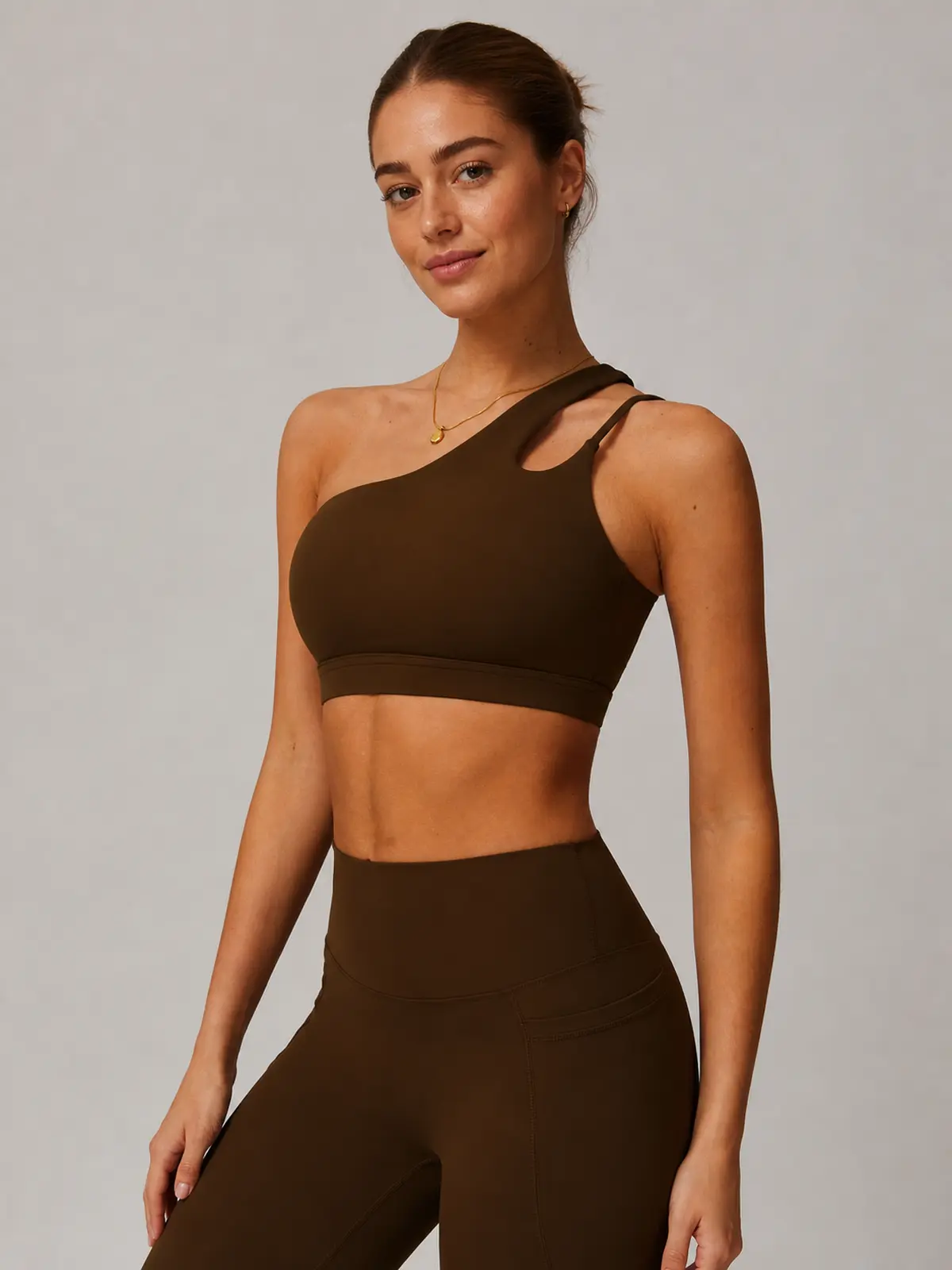 Asymmetry Edit One-Shoulder Cutout Sports Bra — brown — general — authoritative variation match