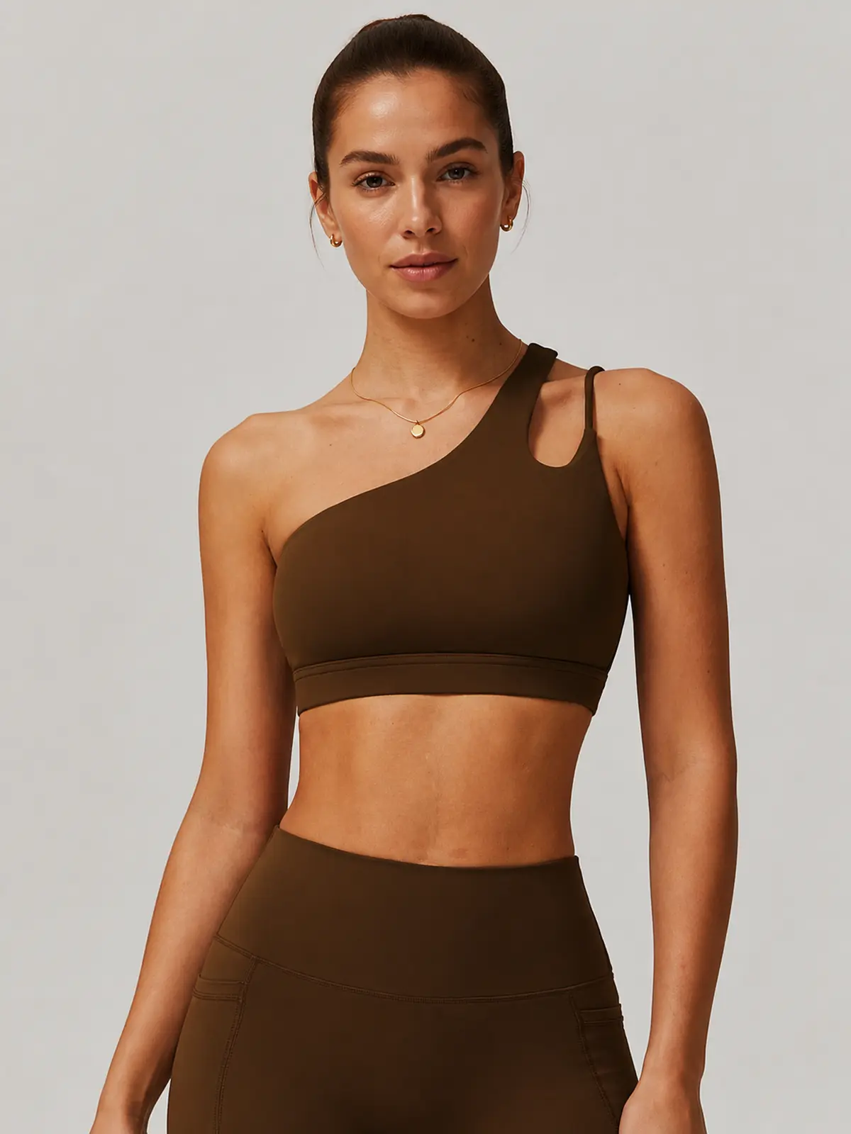 Asymmetry Edit One-Shoulder Cutout Sports Bra — brown — sports-bra — authoritative variation match