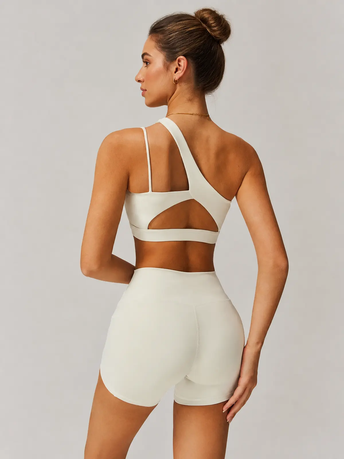 Asymmetry Edit One-Shoulder Cutout Sports Bra — cream beige — general — authoritative variation match
