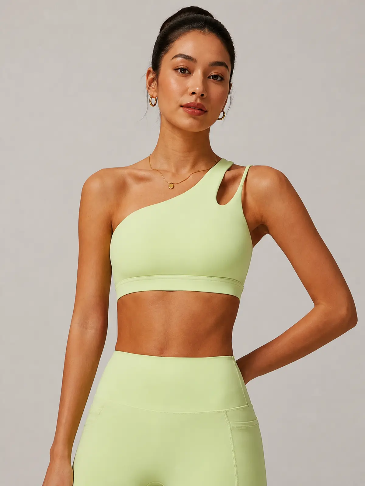 Asymmetry Edit One-Shoulder Cutout Sports Bra — pale yellow-green — general — authoritative variation match
