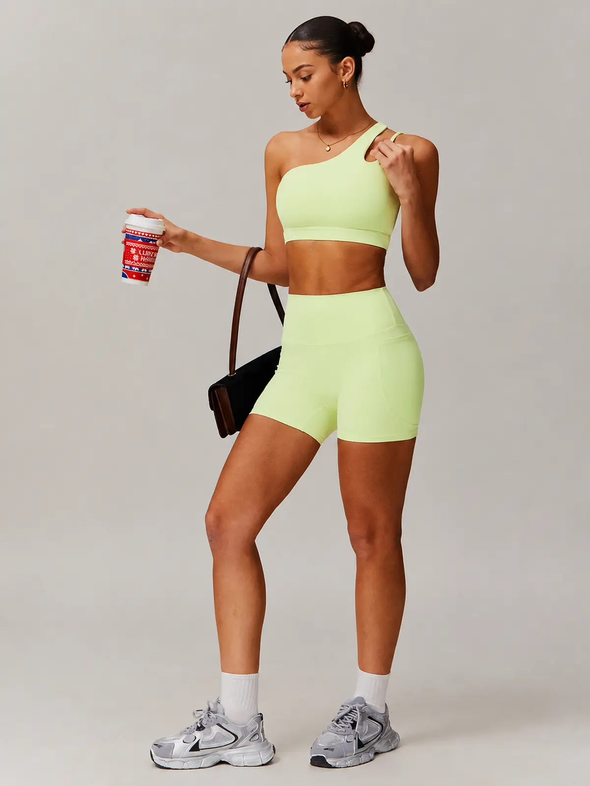 Asymmetry Edit One-Shoulder Cutout Sports Bra — pale yellow-green — general — authoritative variation match