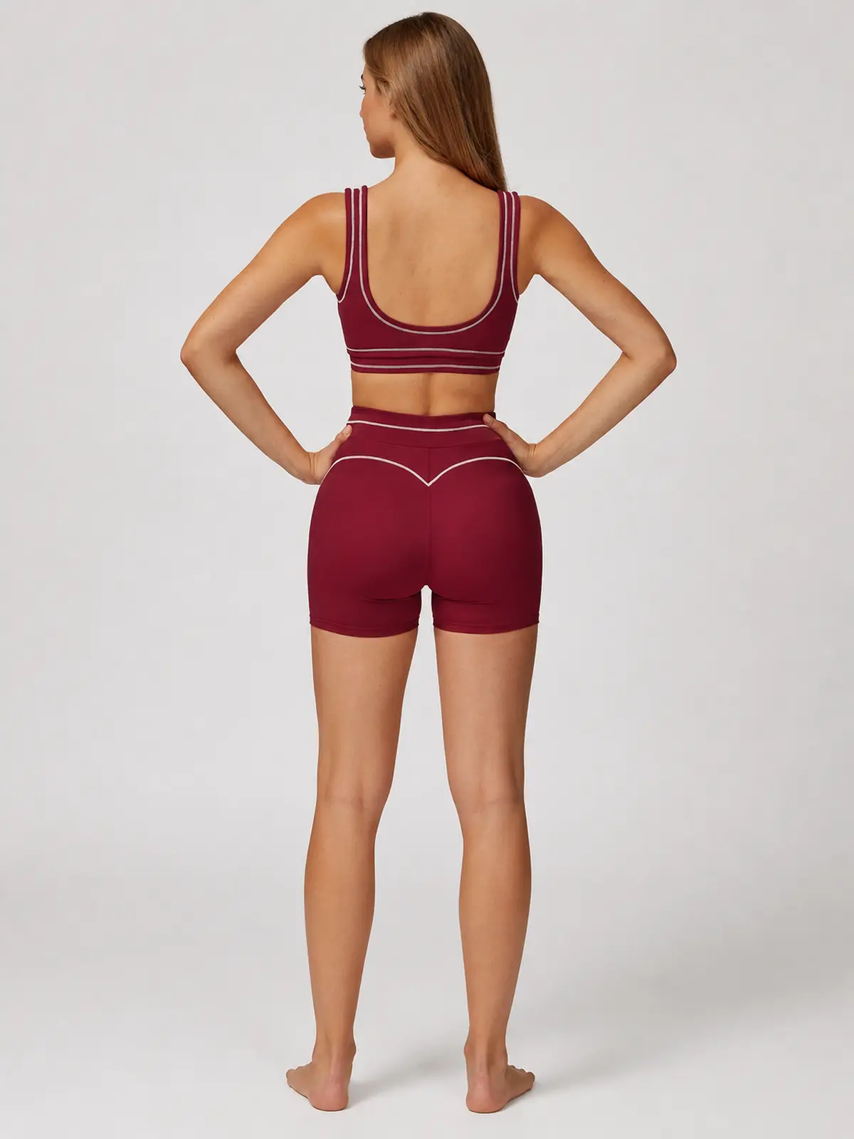 Contrast Rhythm Scoop-Neck Contrast-Trim Sports Bra — burgundy red with pale pink contrast piping — general — authoritative variation match