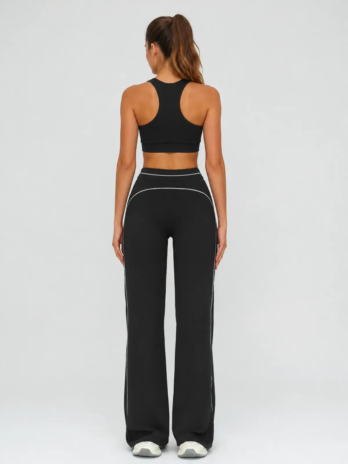 Crescent Thread High-Rise Flare Leggings — studio portrait