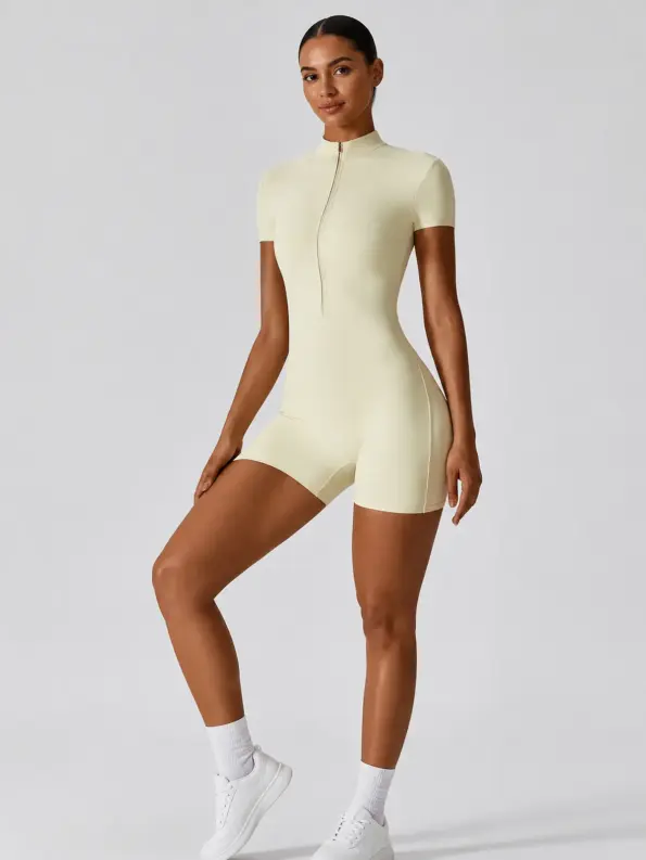 Keystone Verse Short-Sleeve Zip-Front Yoga Romper — pale apricot yellow — authoritative variation match