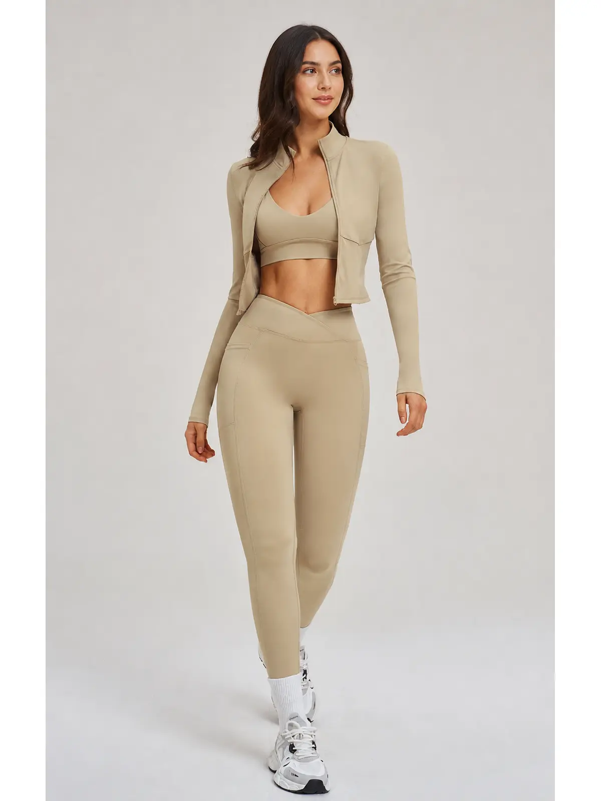 Kinetic Veil Zip-Front Jacket, Sports Bra and Leggings Set — studio portrait