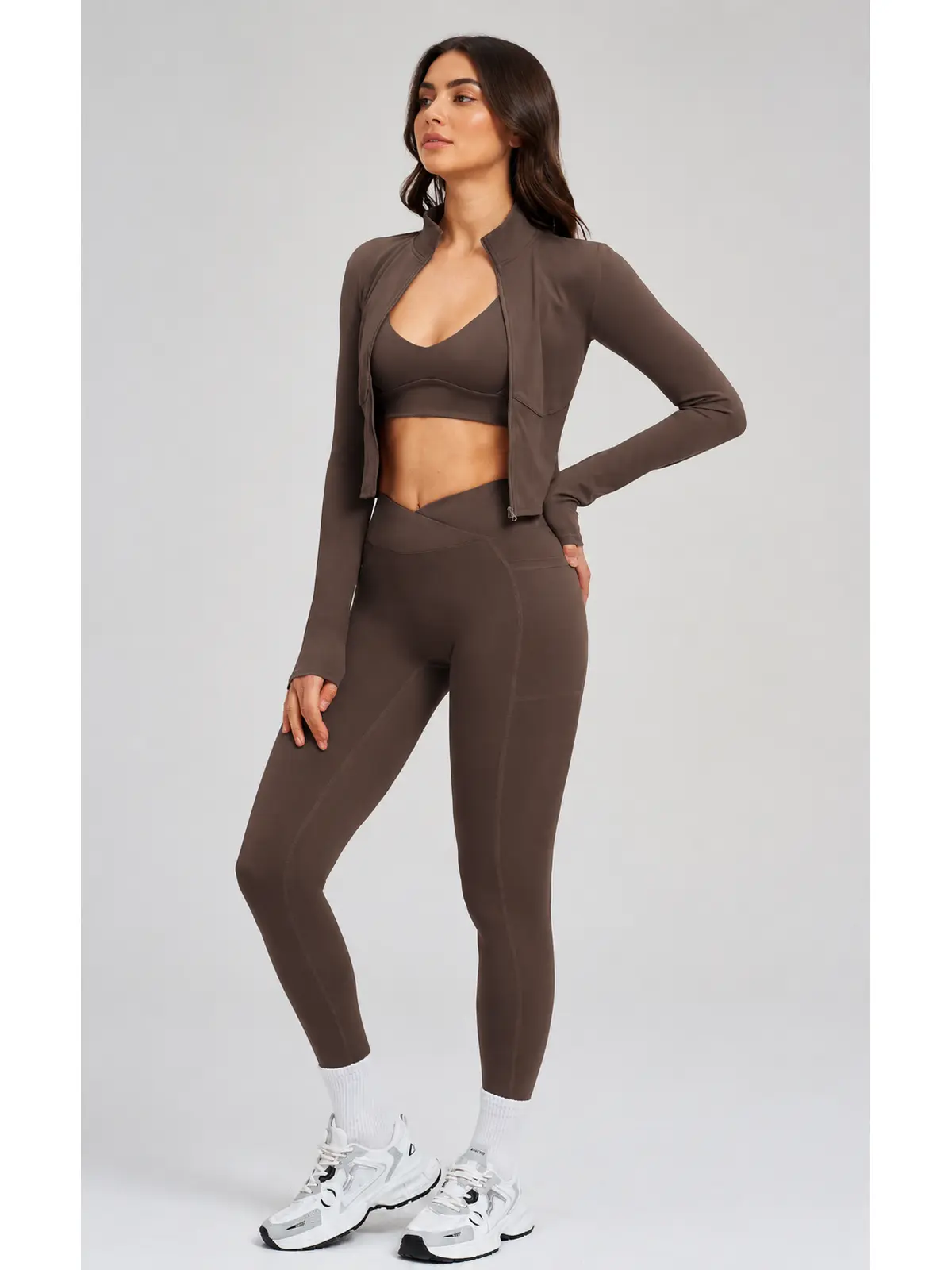 Kinetic Veil Zip-Front Jacket, Sports Bra and Leggings Set — studio portrait