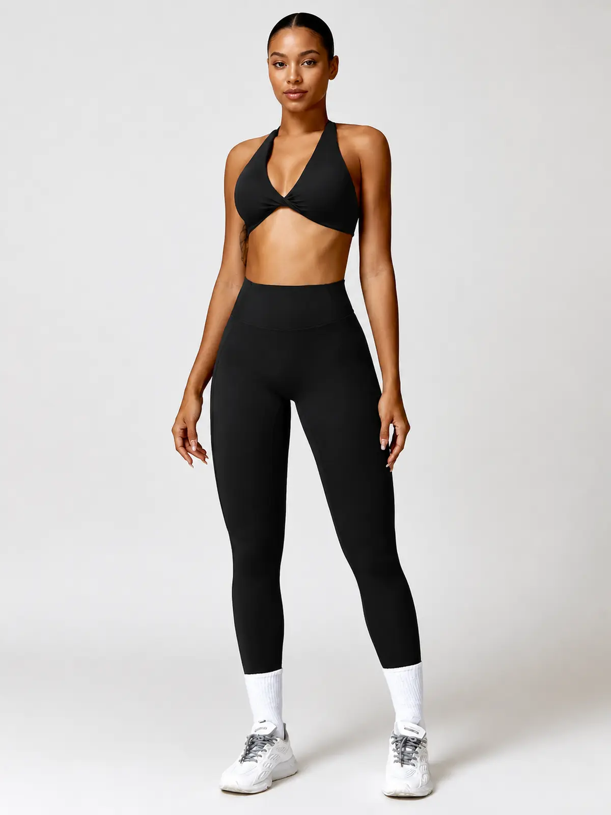 Marina Halo Twist-Front Halter Sports Bra — black — general — authoritative variation match