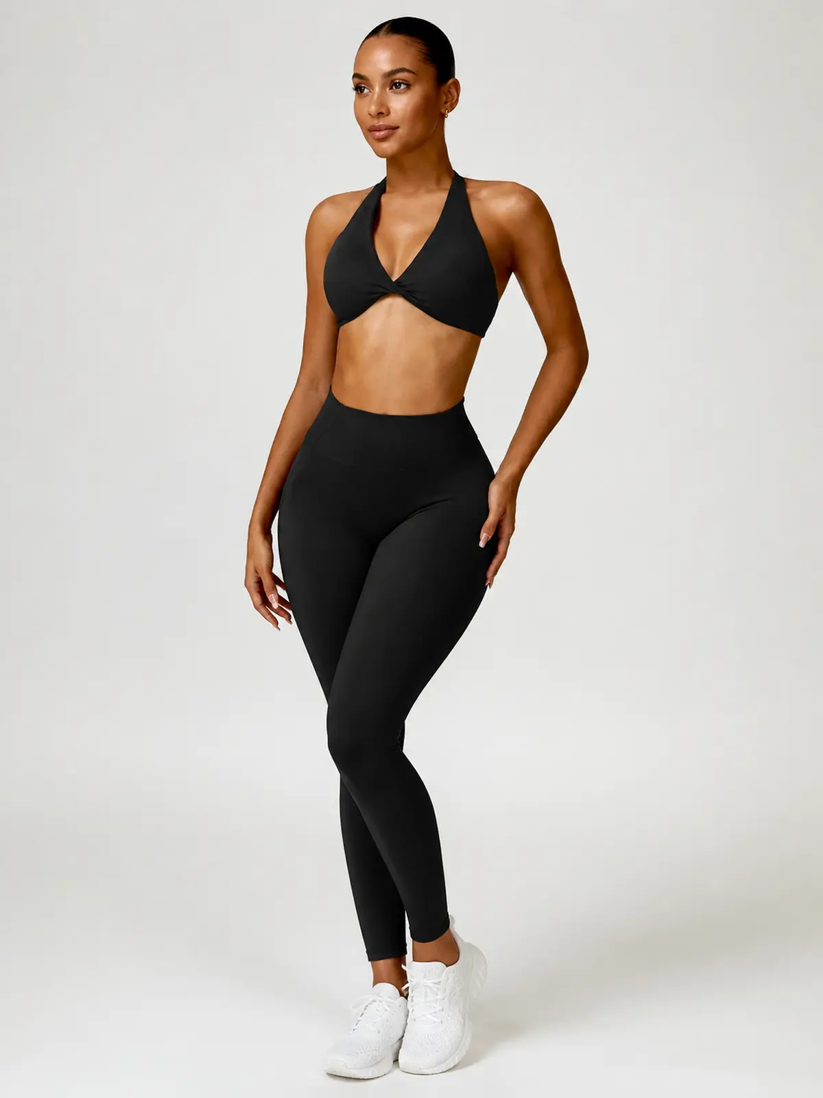 Marina Halo Twist-Front Halter Sports Bra — black — general — authoritative variation match