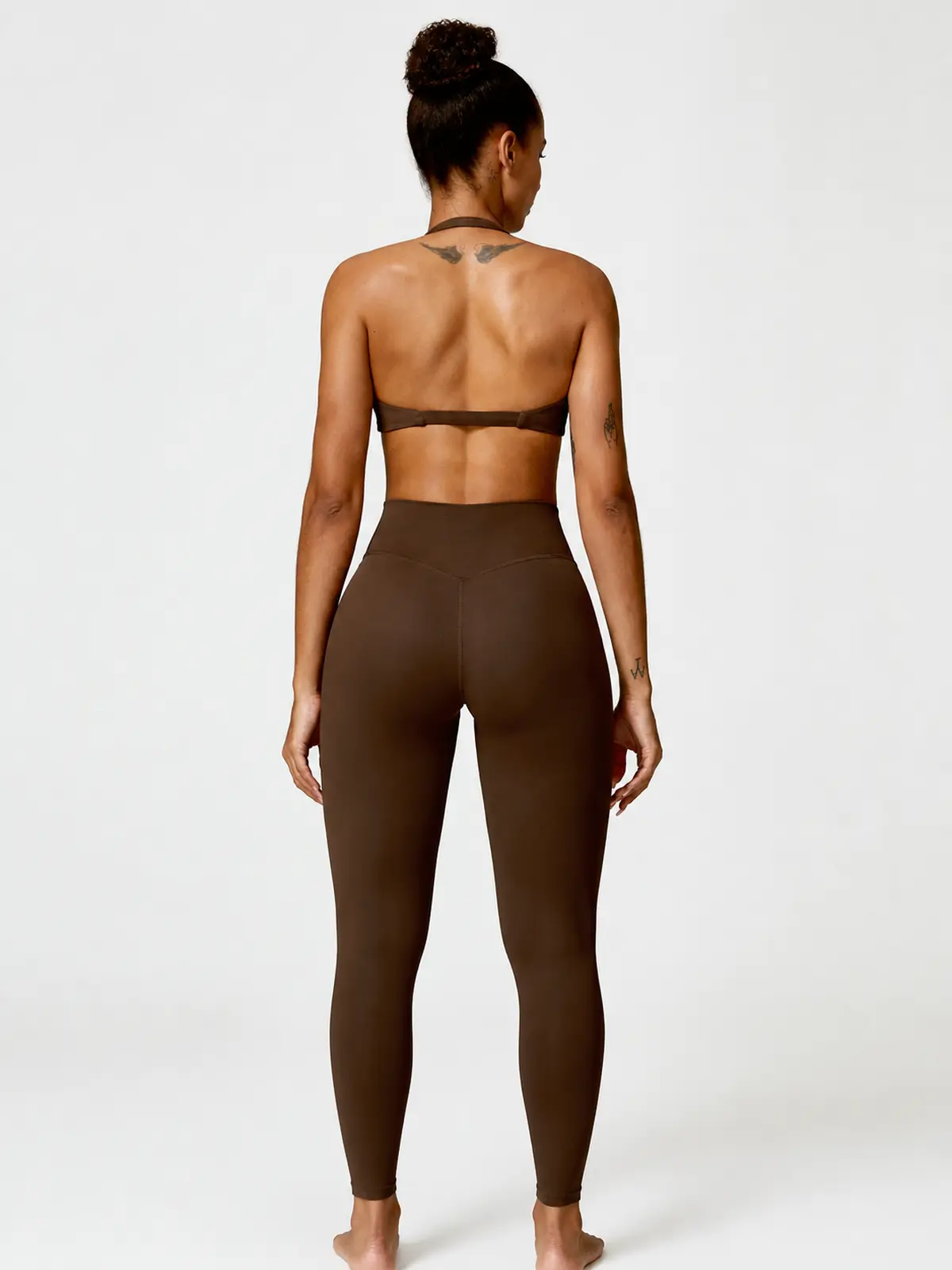 Marina Halo Twist-Front Halter Sports Bra — brown — general — authoritative variation match