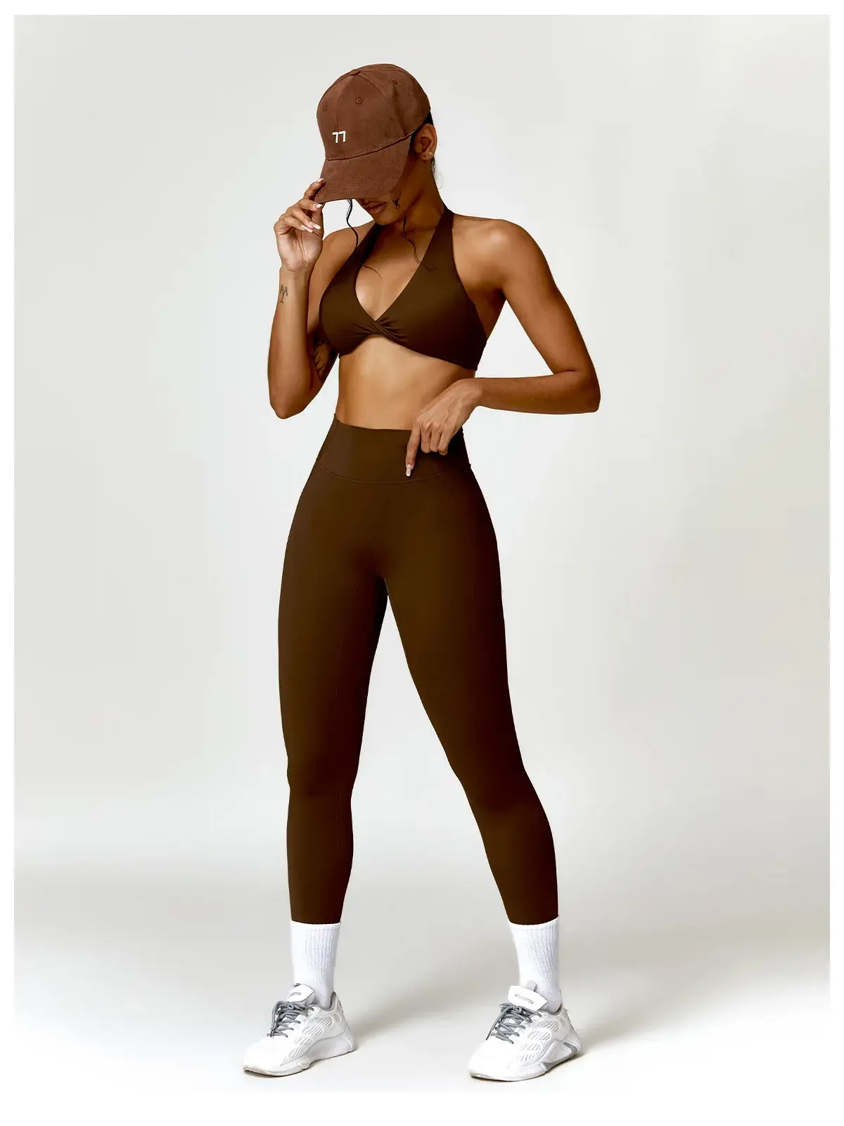 Marina Halo Twist-Front Halter Sports Bra — brown — general — authoritative variation match