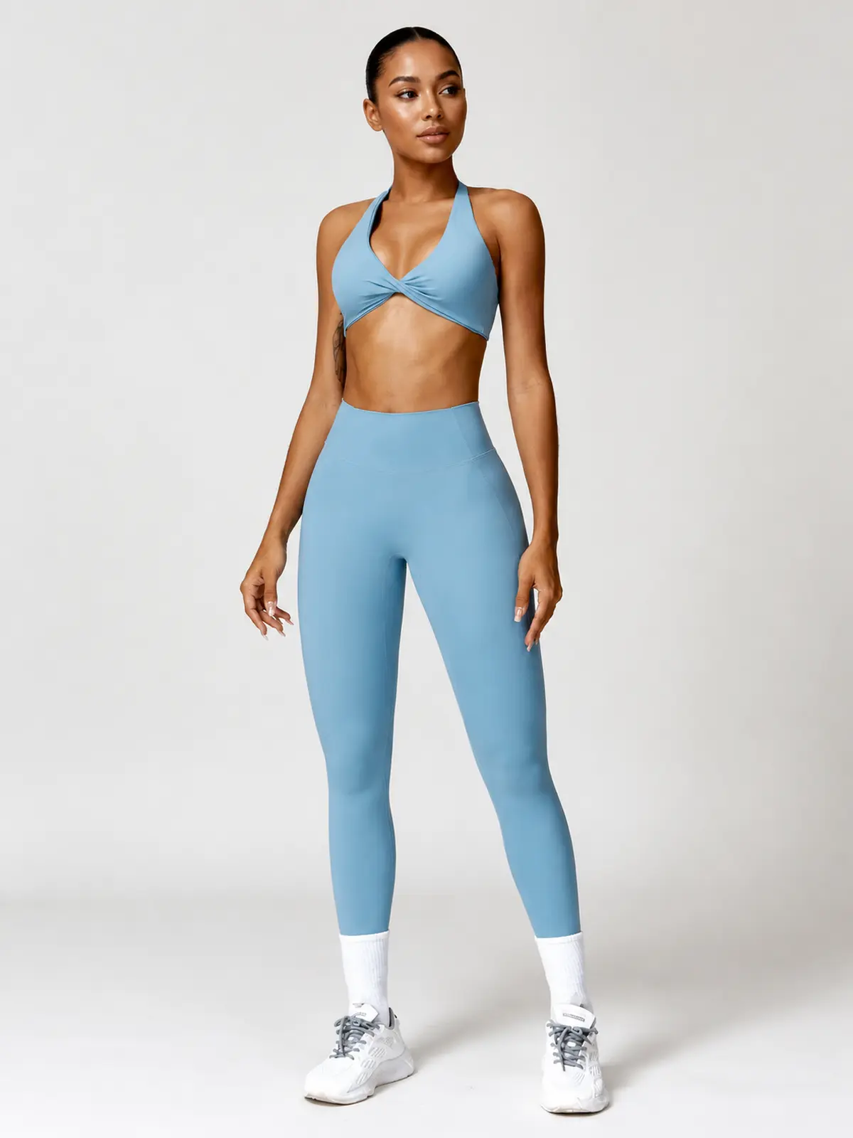 Marina Halo Twist-Front Halter Sports Bra — haze blue — general — authoritative variation match