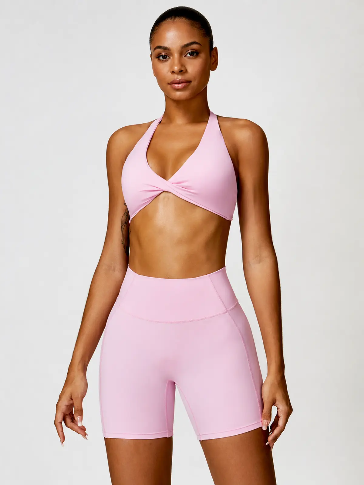 Marina Halo Twist-Front Halter Sports Bra — light pink — general — authoritative variation match