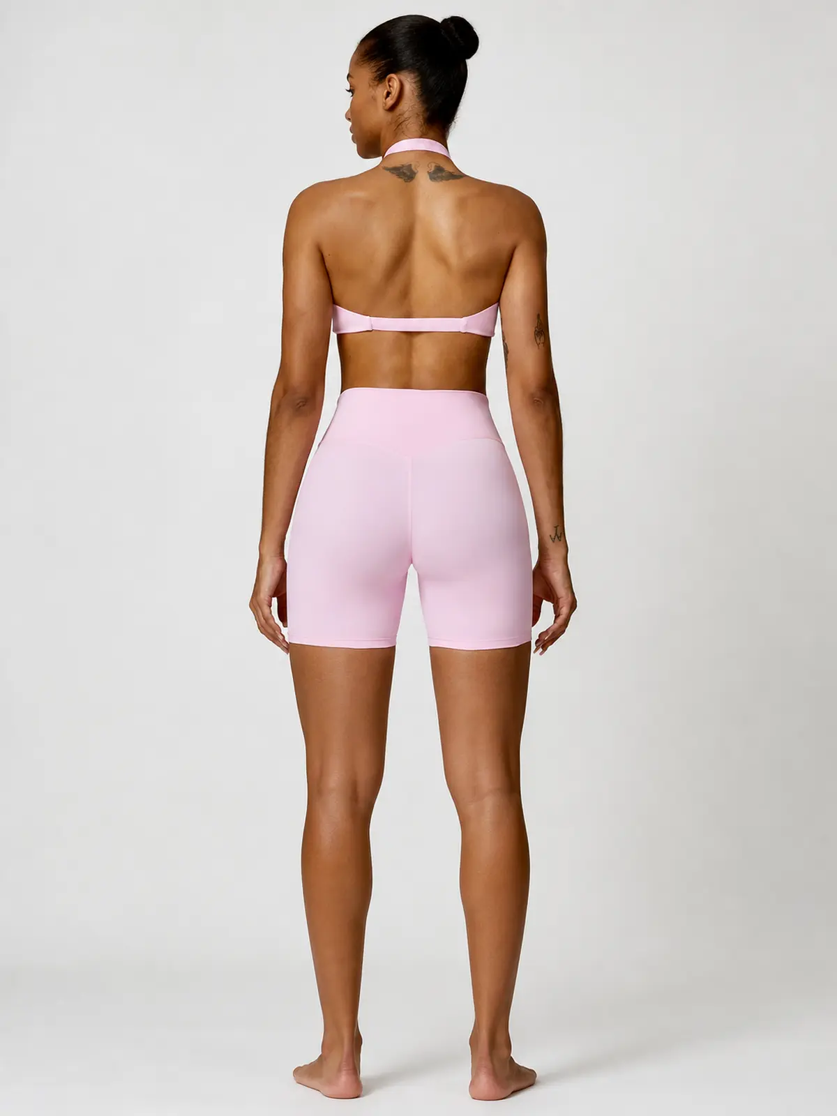 Marina Halo Twist-Front Halter Sports Bra — light pink — general — authoritative variation match