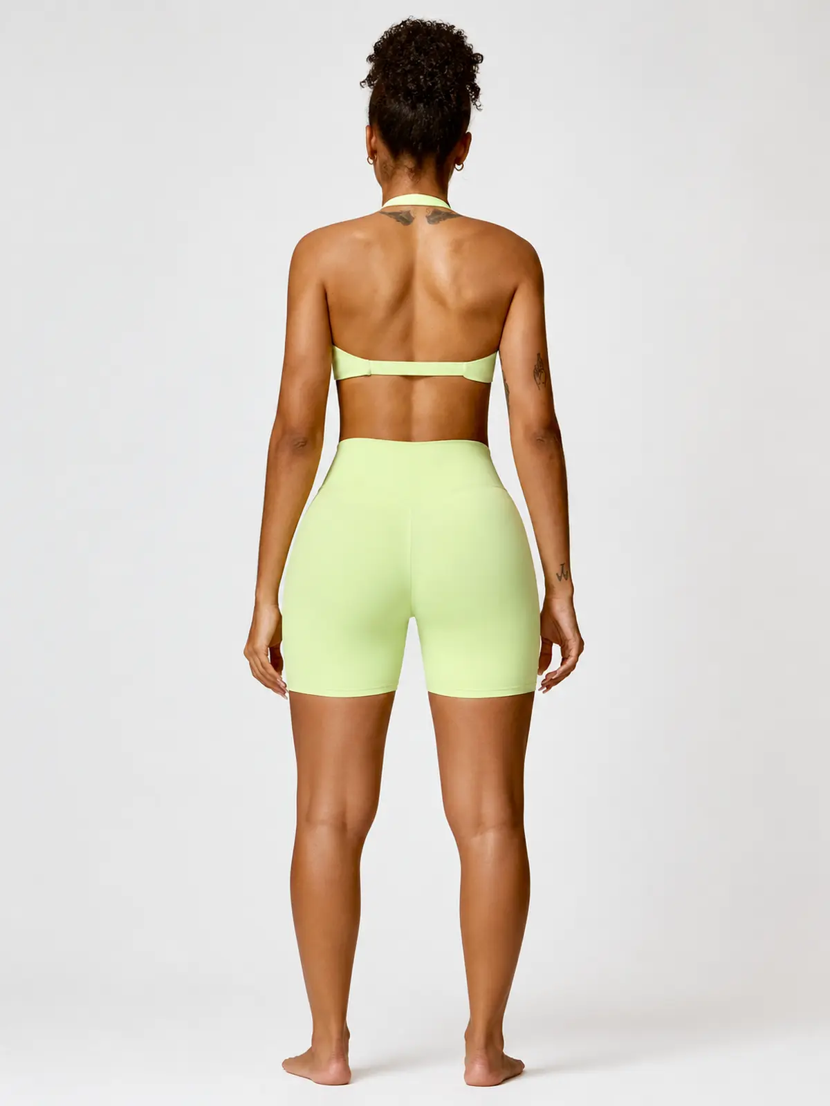 Marina Halo Twist-Front Halter Sports Bra — light yellow green — general — authoritative variation match