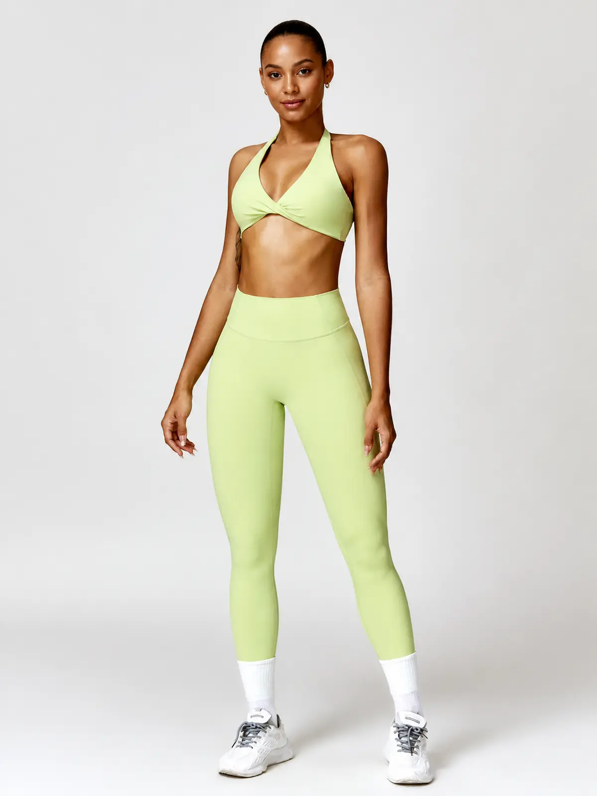 Marina Halo Twist-Front Halter Sports Bra — light yellow green — general — authoritative variation match
