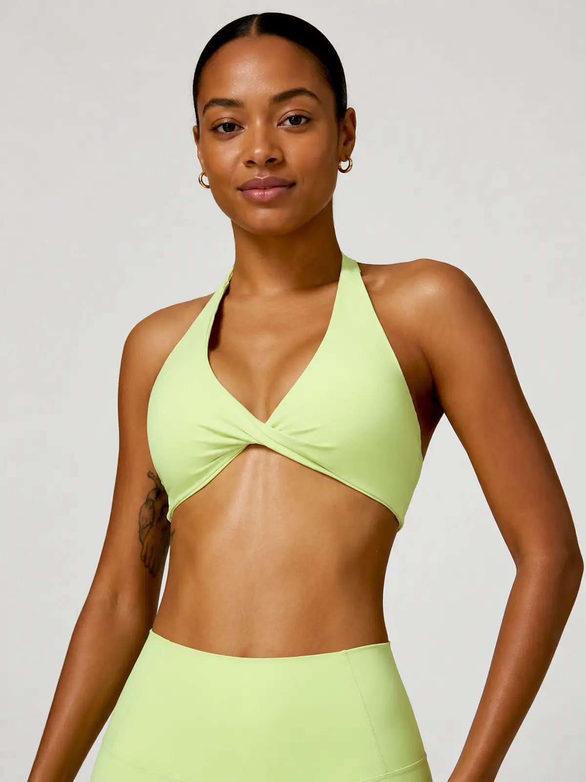 Marina Halo Twist-Front Halter Sports Bra — light yellow green — general — authoritative variation match