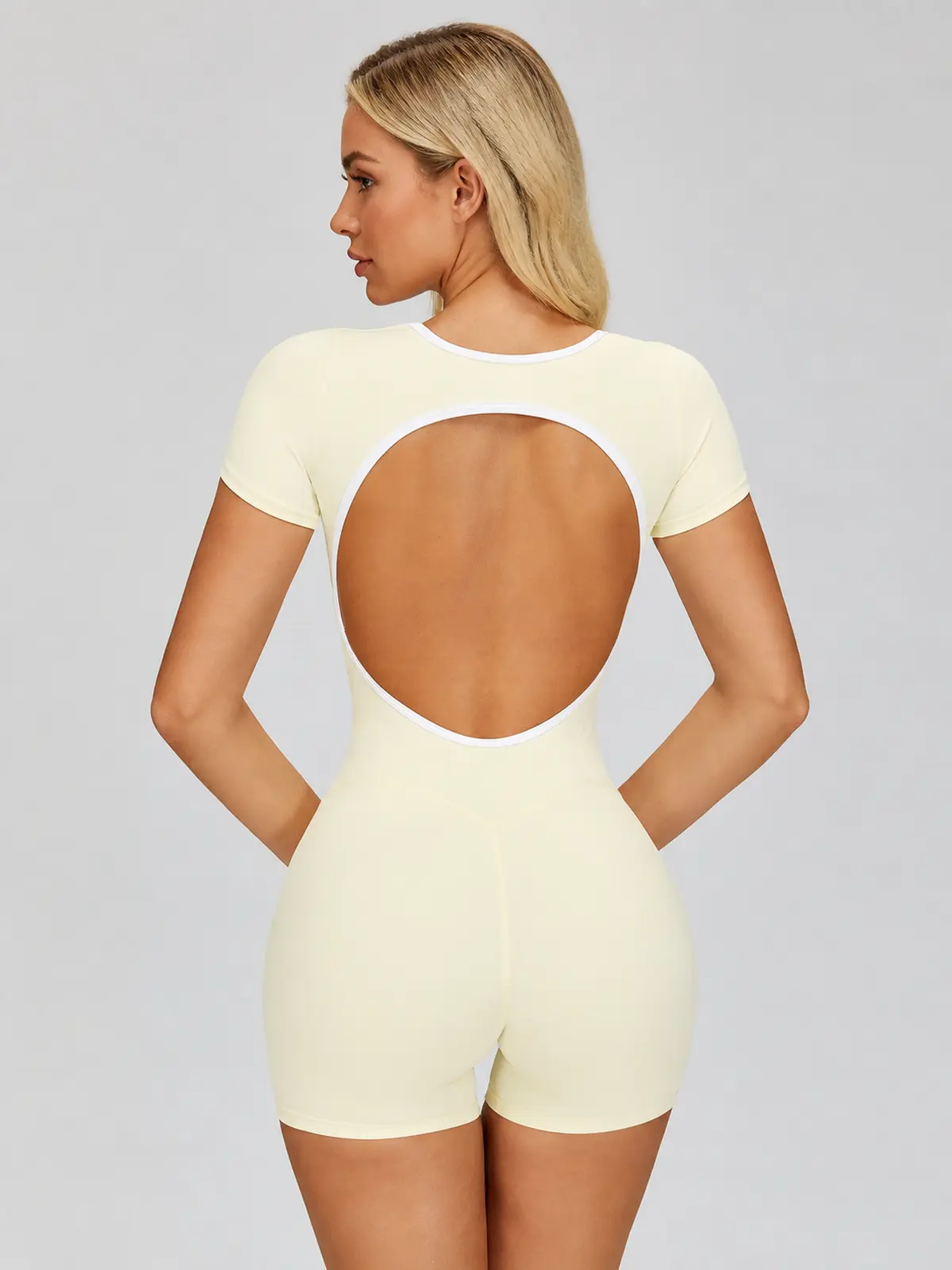 Mariner Outline Short-Sleeve Contrast-Trim Yoga Romper — pale ivory yellow with white trim — authoritative variation match