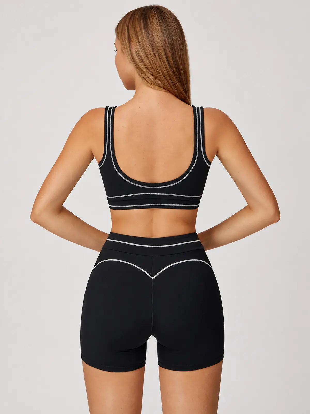 Mariner Stitch Scoop-Neck Contrast-Trim Sports Bra — black with light gray contrast stitching — general — authoritative variation match