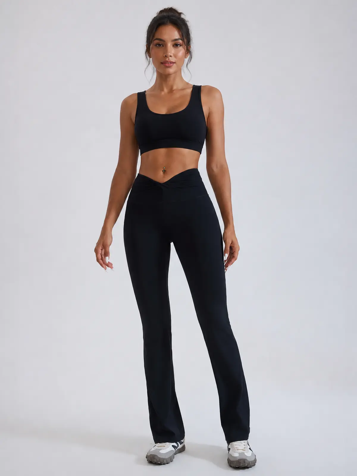 Mosaic Dawn Twist-Waist Flare Leggings — black — flare-leggings — authoritative variation match