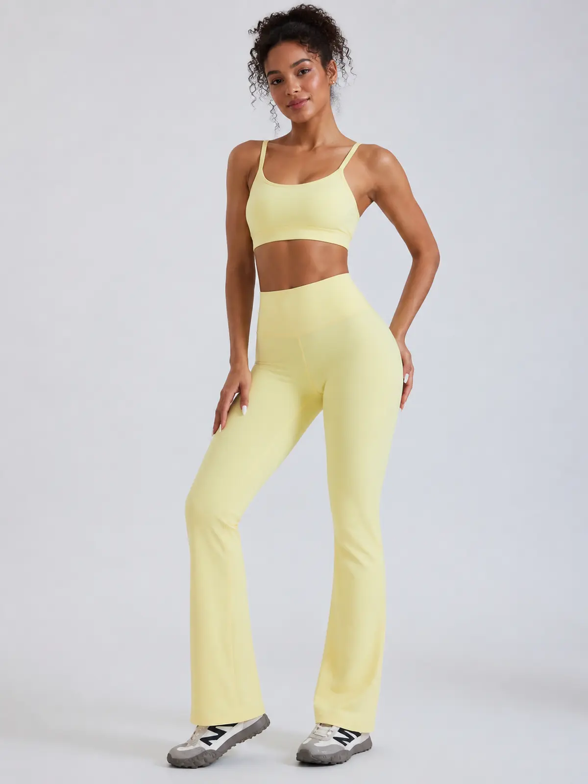 Mosaic Dawn Twist-Waist Flare Leggings — pale banana yellow — flare-leggings — authoritative variation match