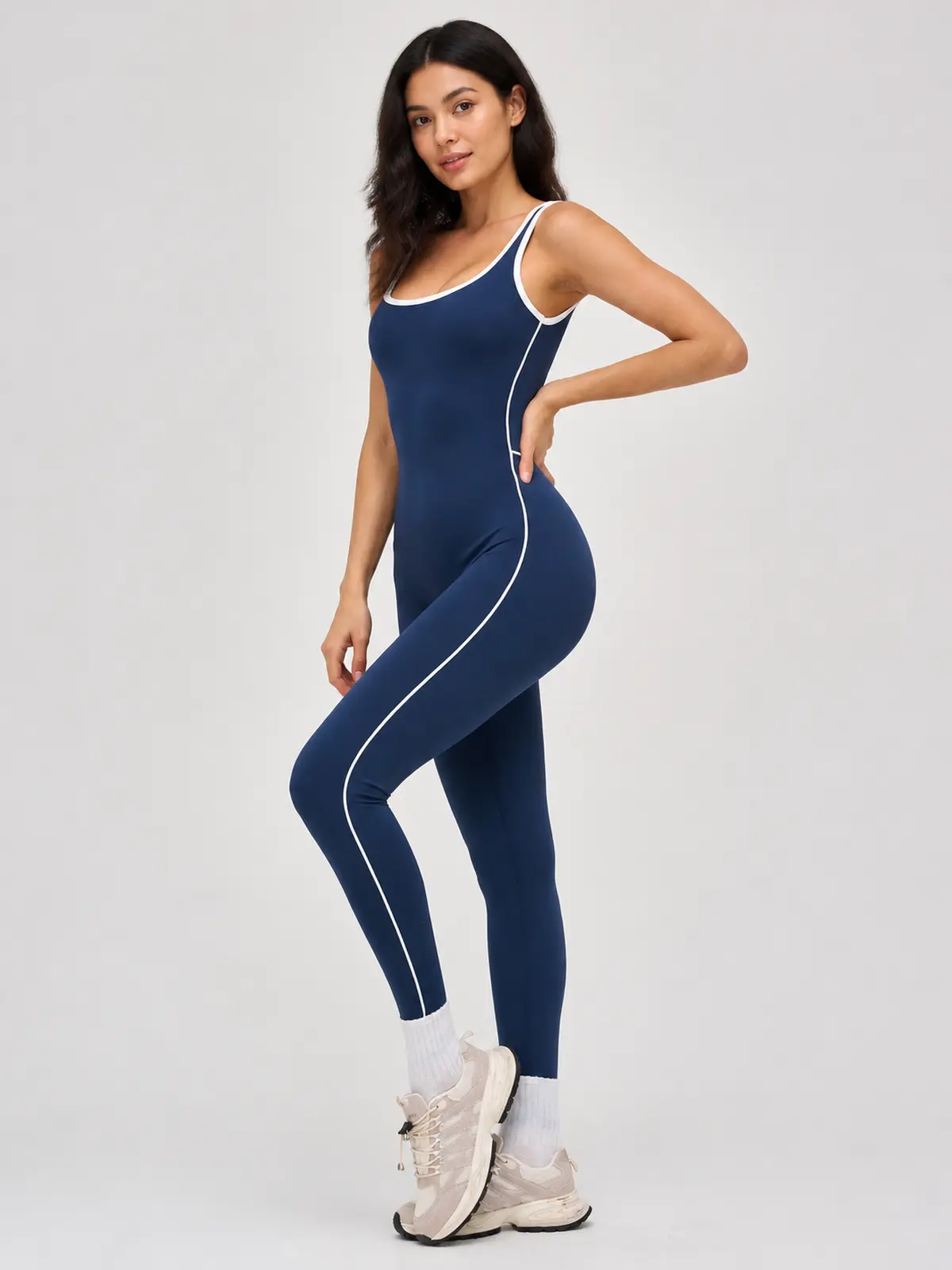 Piped Horizon Sleeveless Scoop-Neck Unitard — dark navy blue with white contrast trim — authoritative variation match