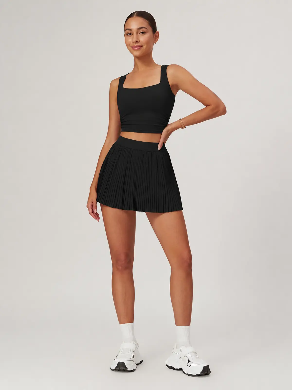 Pleatline Orbit Pleated Yoga Skirt — black — skort — authoritative variation match