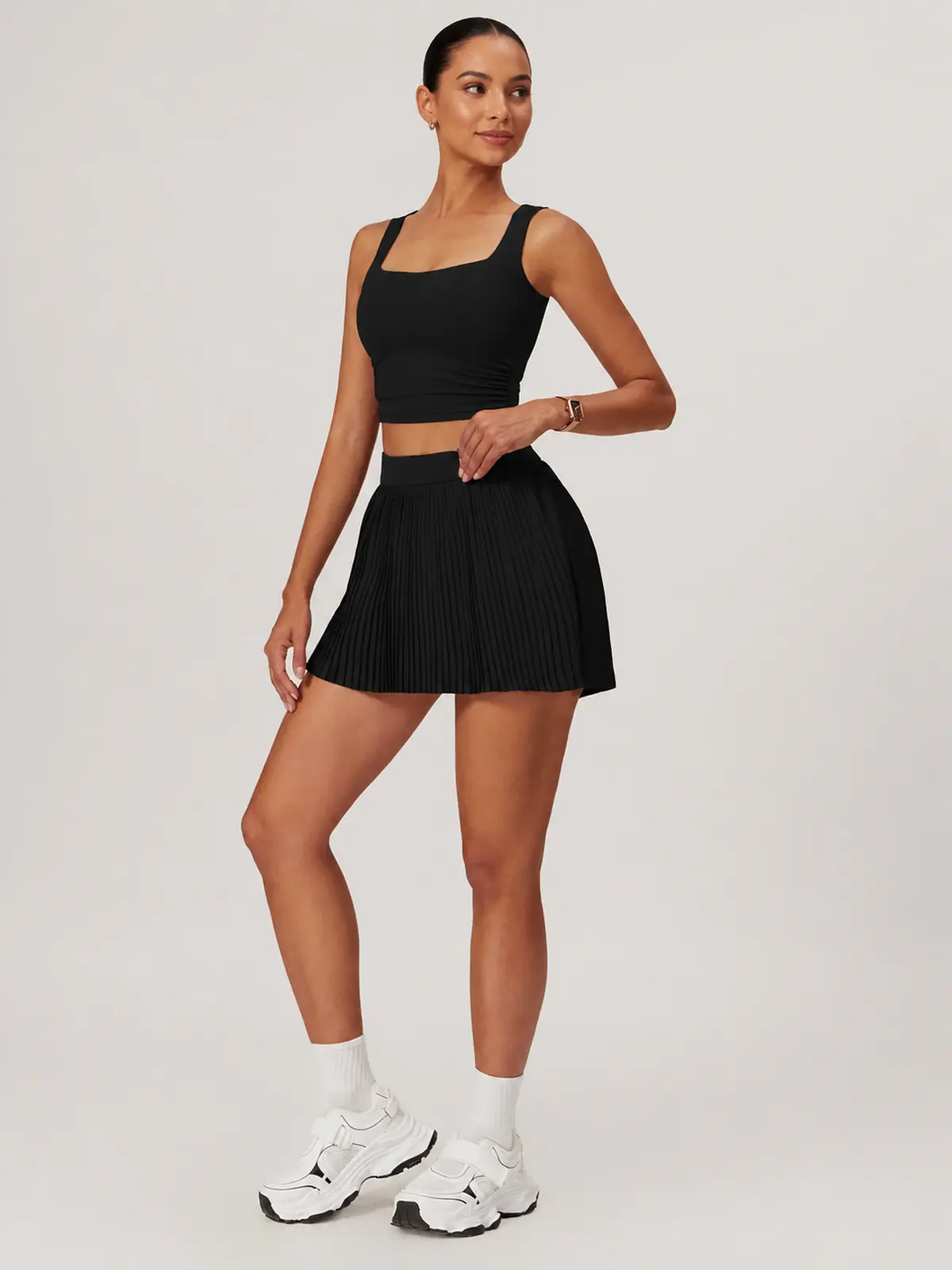 Pleatline Orbit Pleated Yoga Skirt — black — skort — authoritative variation match