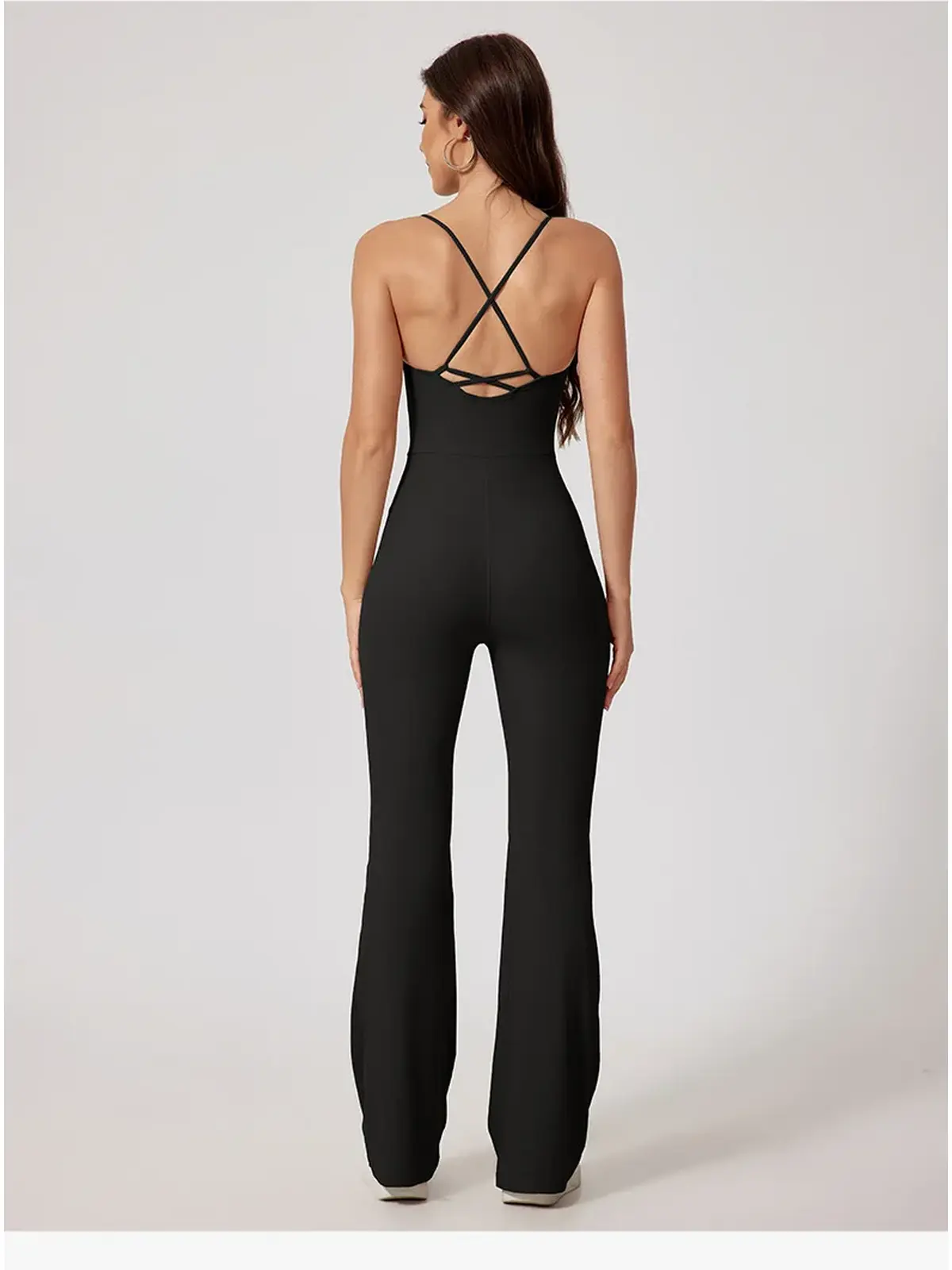 Prism Dusk Sleeveless Ribbed Flared-Leg Yoga Jumpsuit — black — authoritative variation match