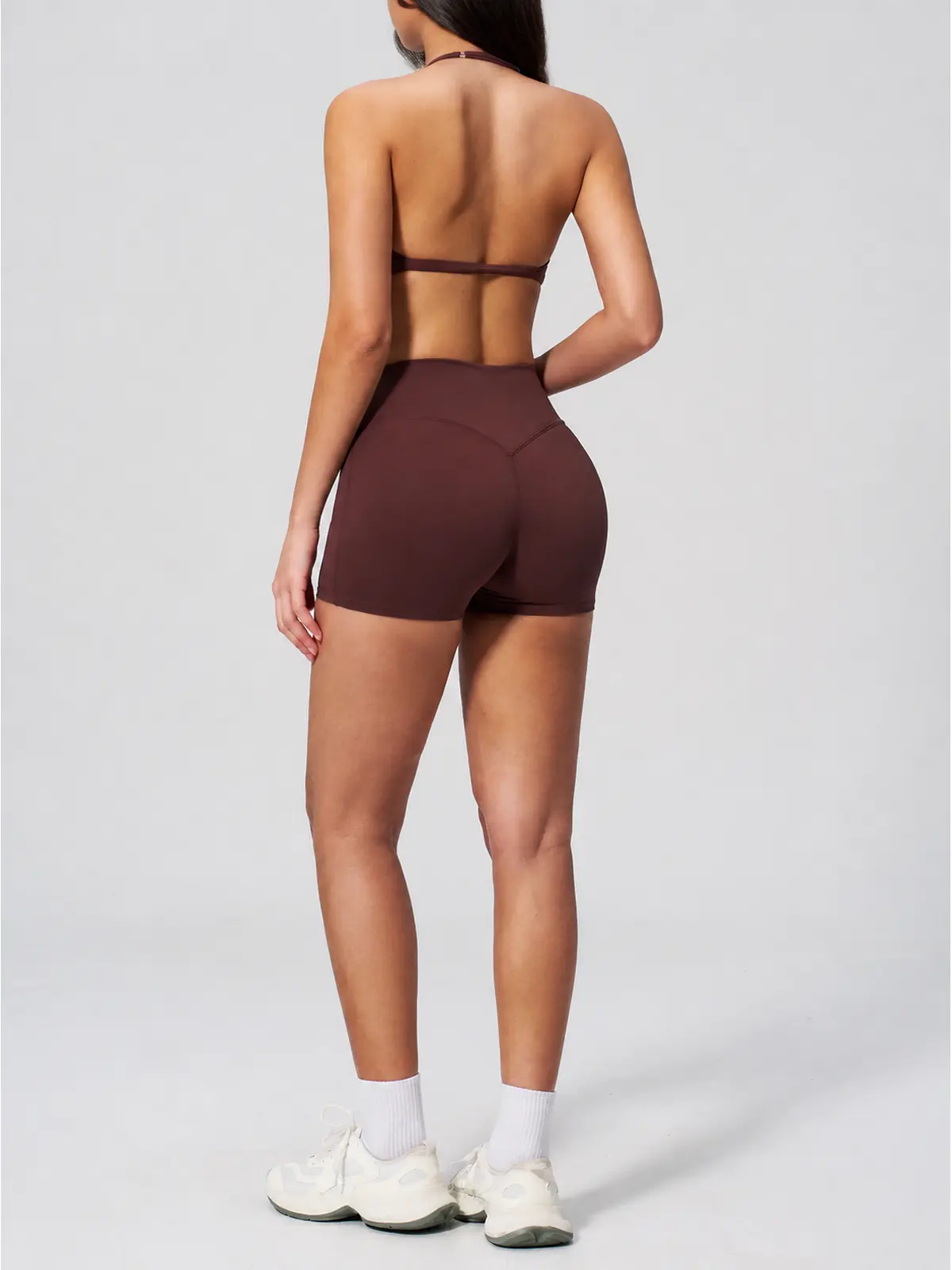Rowan Current Halter Sports Bra and Bike Shorts Set — studio portrait
