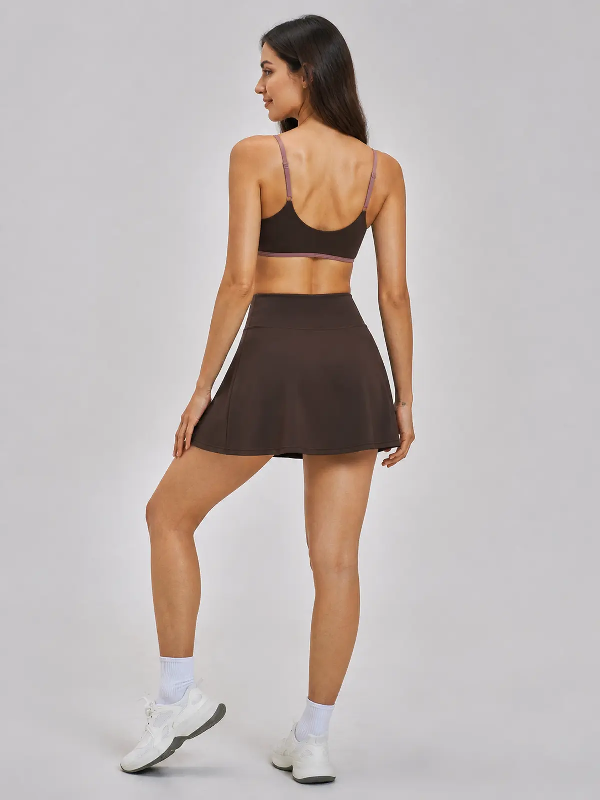 Studio Petal Sports Bra and A-Line Skirt Set — studio portrait