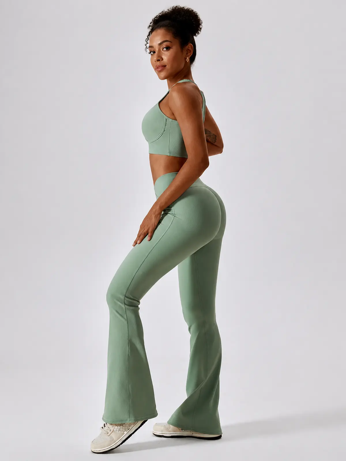 Verve Ledger High-Rise Crossover Flare Leggings — basil green — general — authoritative variation match