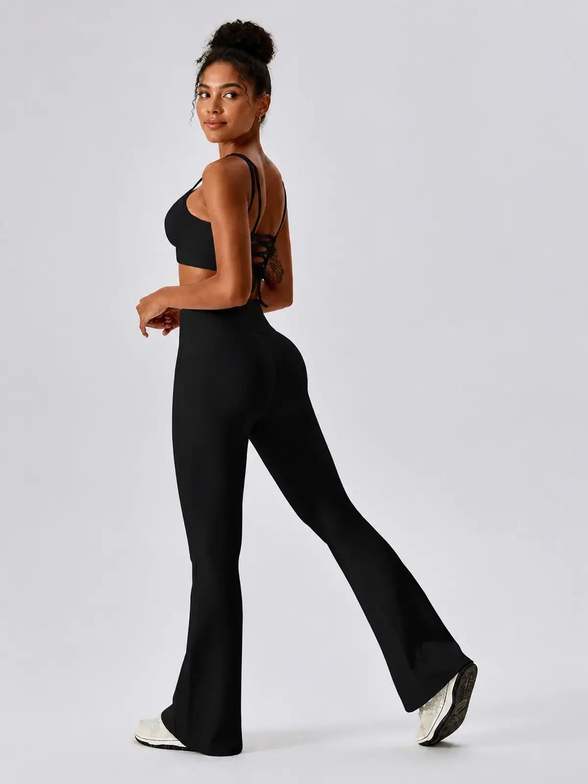 Verve Ledger High-Rise Crossover Flare Leggings — black — general — authoritative variation match
