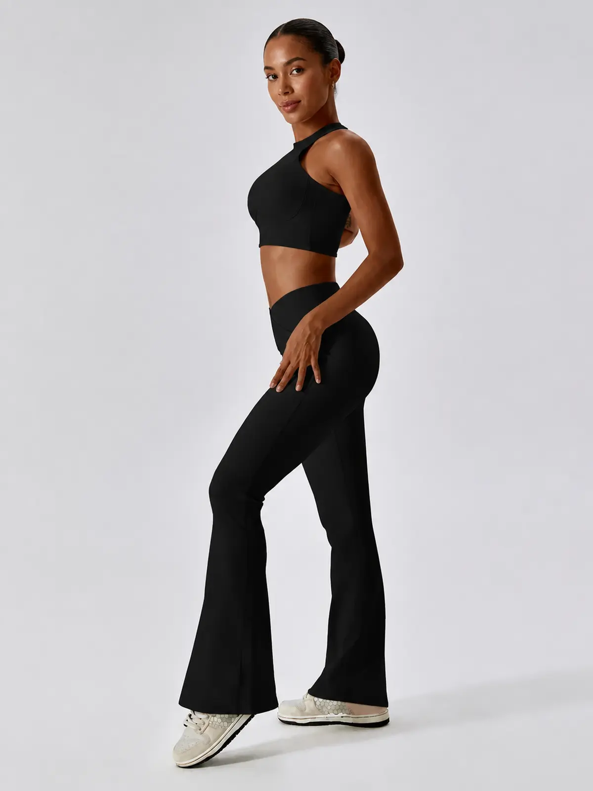Verve Ledger High-Rise Crossover Flare Leggings — black — general — authoritative variation match