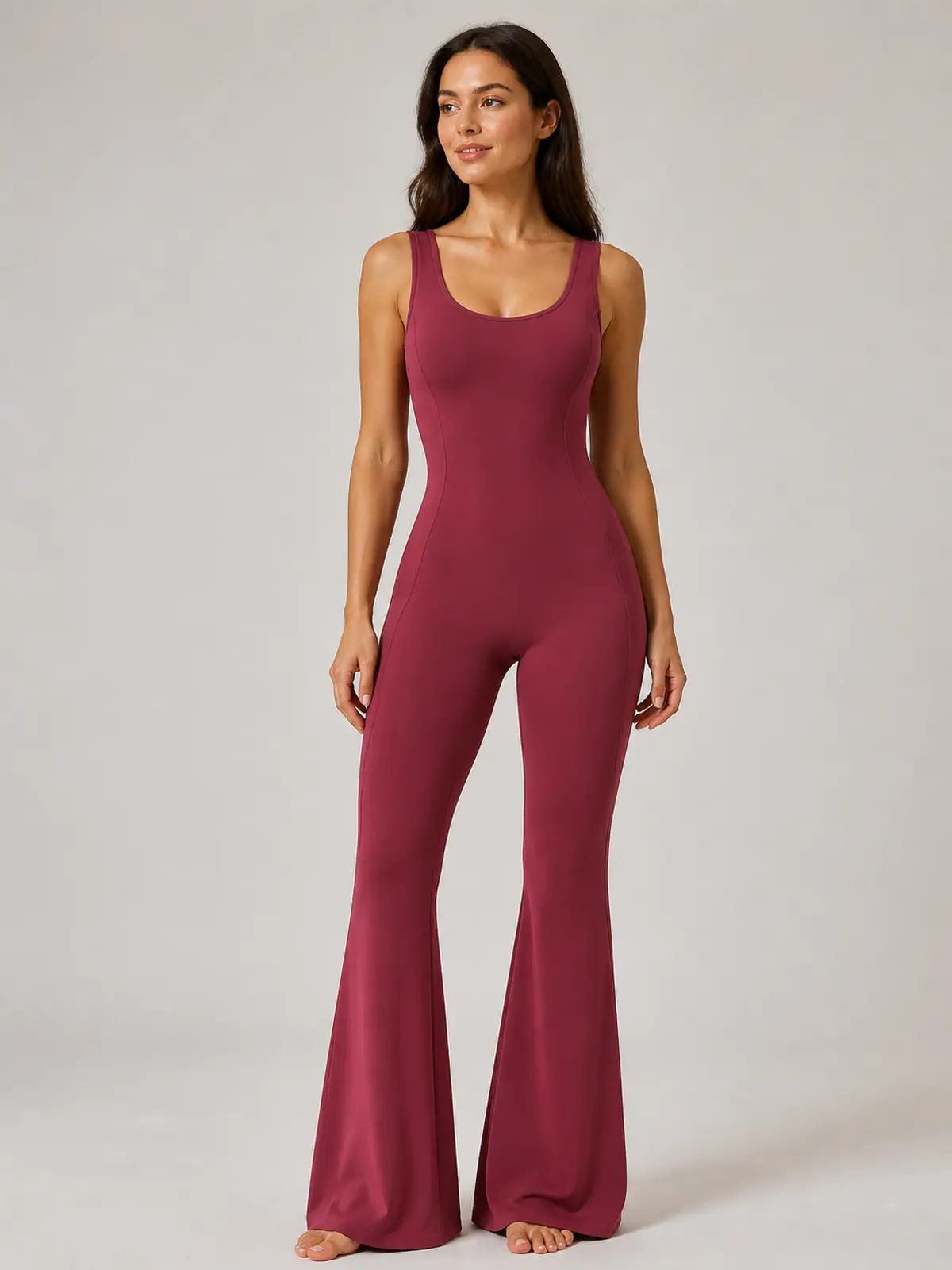 Vesper Arc Sleeveless Flared-Leg Yoga Jumpsuit — burgundy red — authoritative variation match