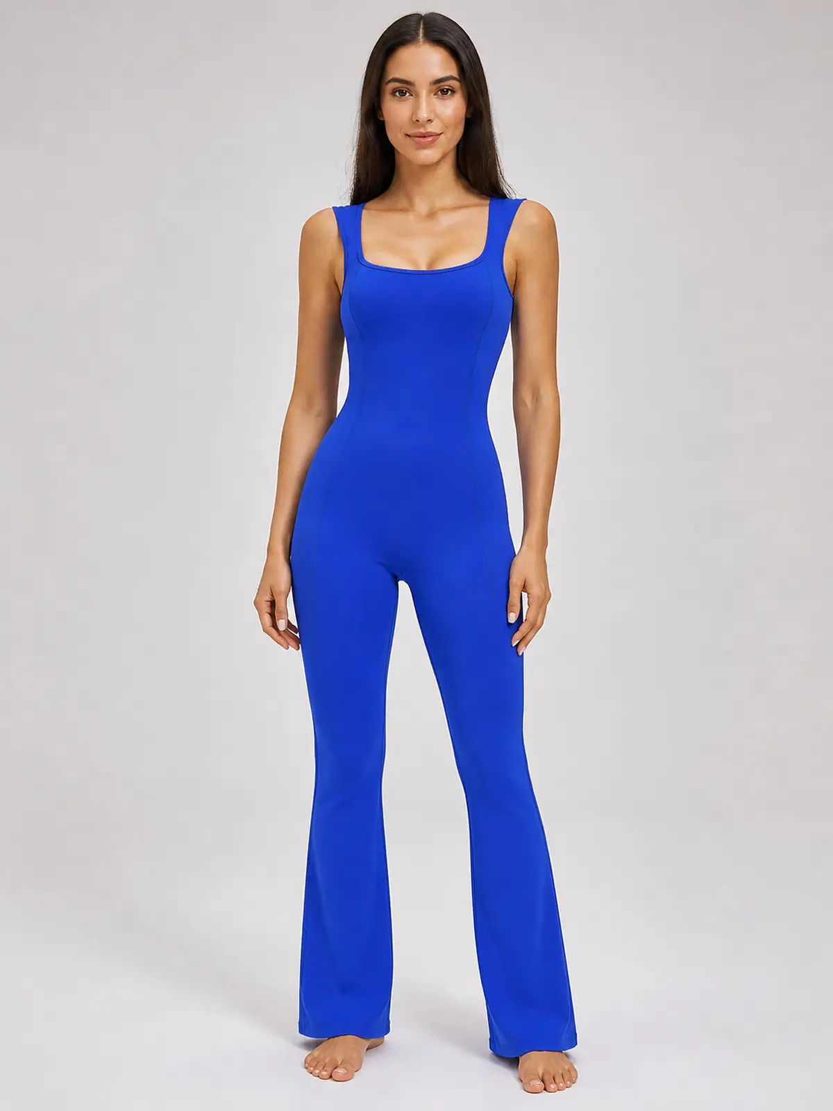 Vesper Arc Sleeveless Flared-Leg Yoga Jumpsuit — royal blue — authoritative variation match