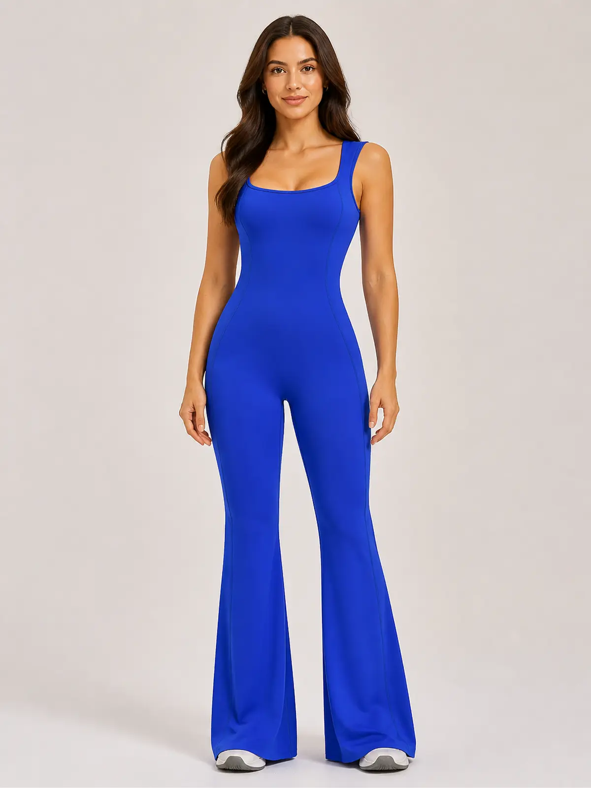 Vesper Arc Sleeveless Flared-Leg Yoga Jumpsuit — royal blue — authoritative variation match