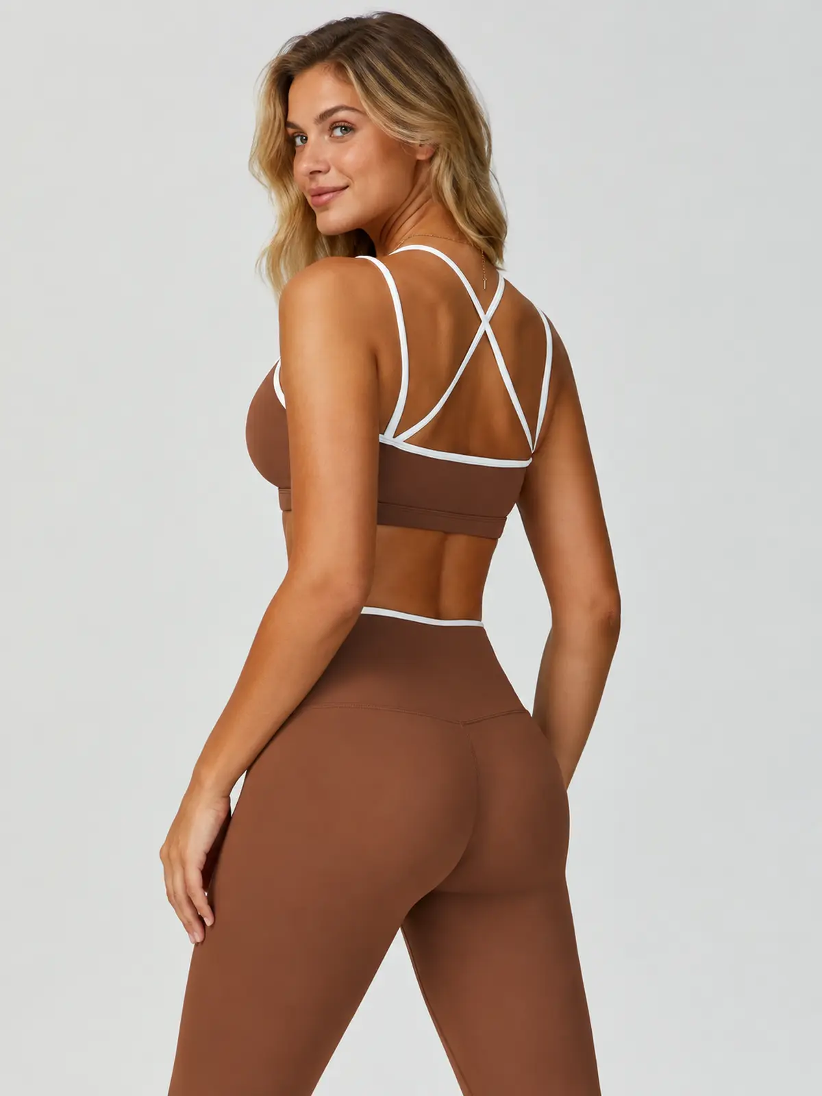 Contrast Echo Scoop-Neck Sports Bra — brown with white trim — general — authoritative variation match
