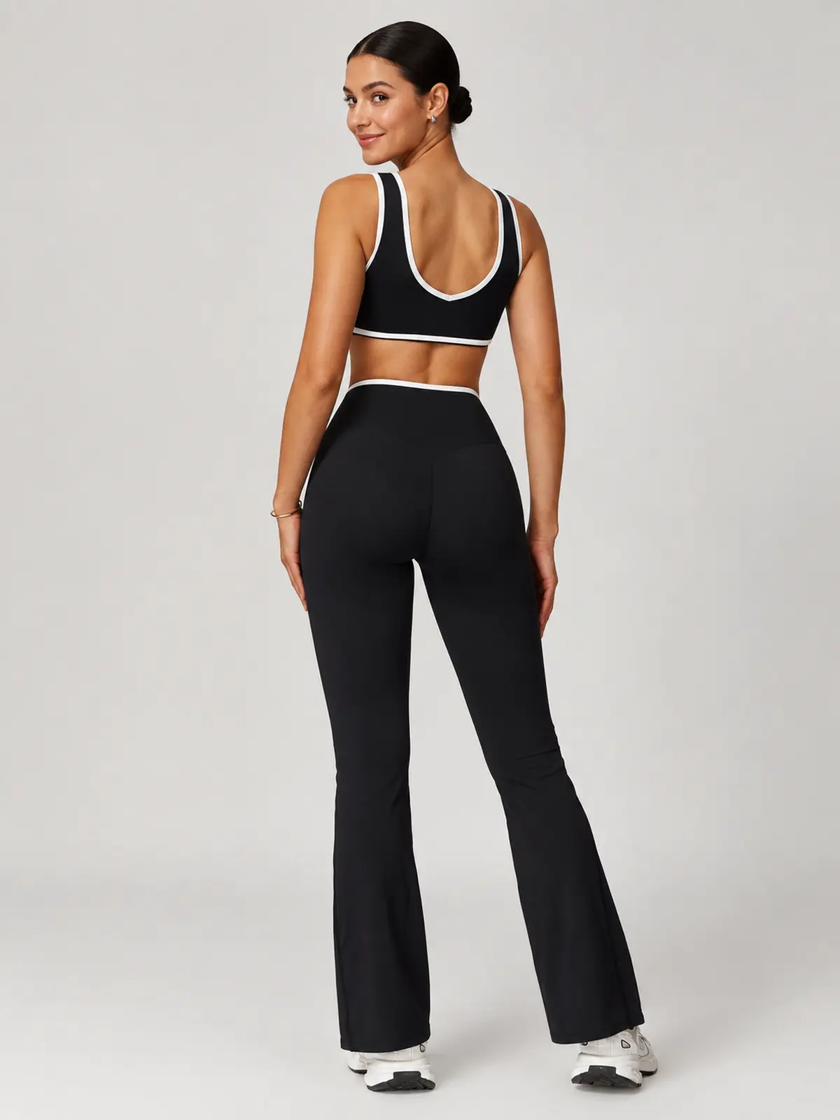 Crossover Orbit High-Rise Flare Leggings — black with white contrast waistband trim — general — authoritative variation match