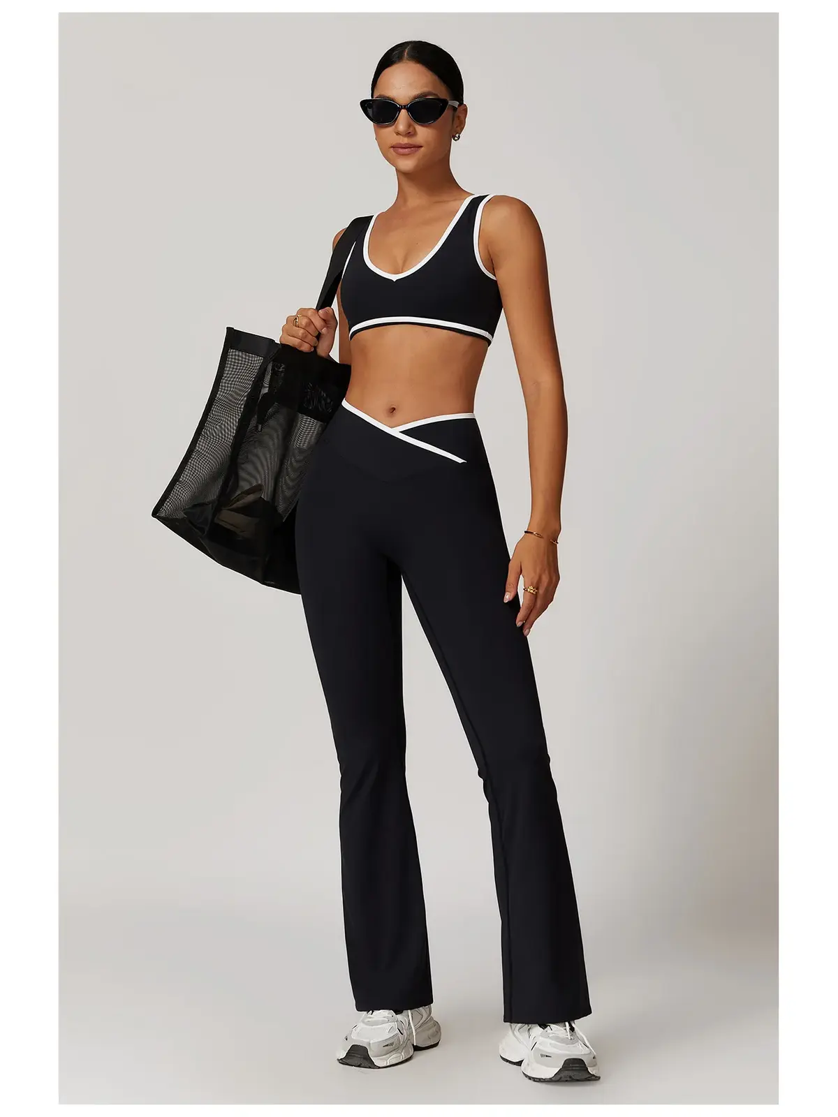 Crossover Orbit High-Rise Flare Leggings — black with white contrast waistband trim — general — authoritative variation match