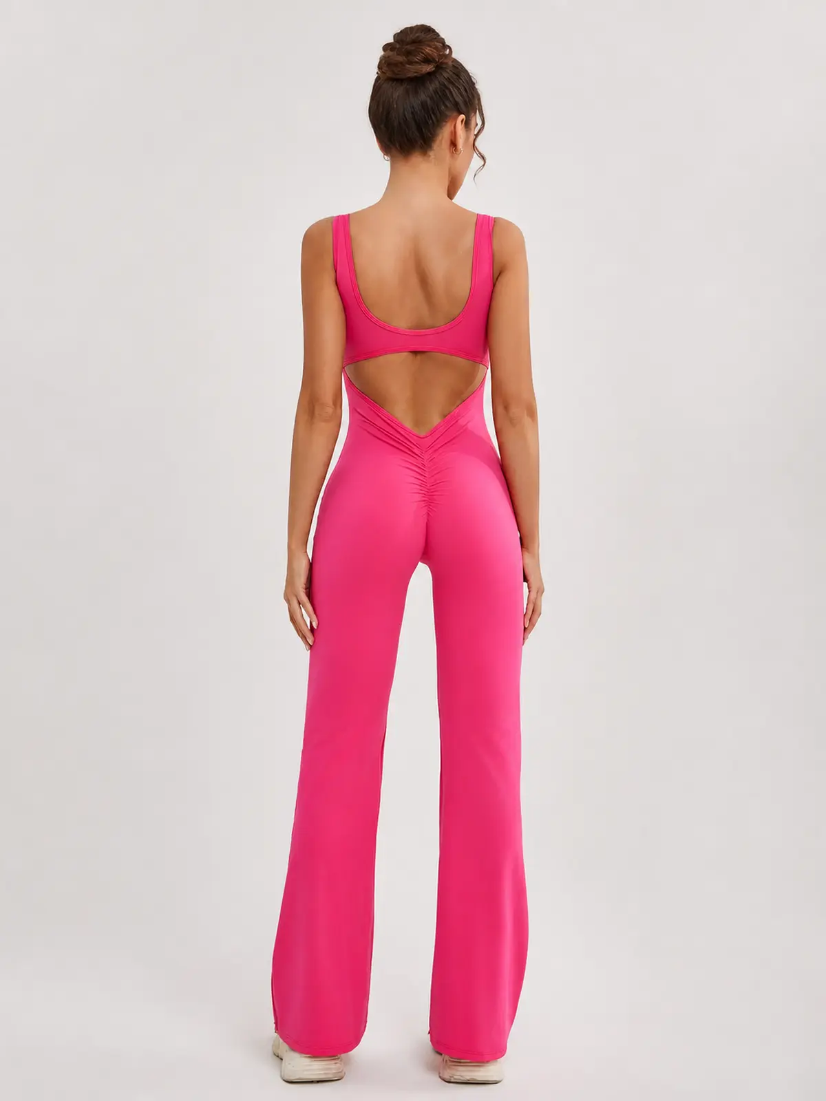 Pavilion Drift Sleeveless Open-Back Flared-Leg Yoga Jumpsuit — bright pink — authoritative variation match