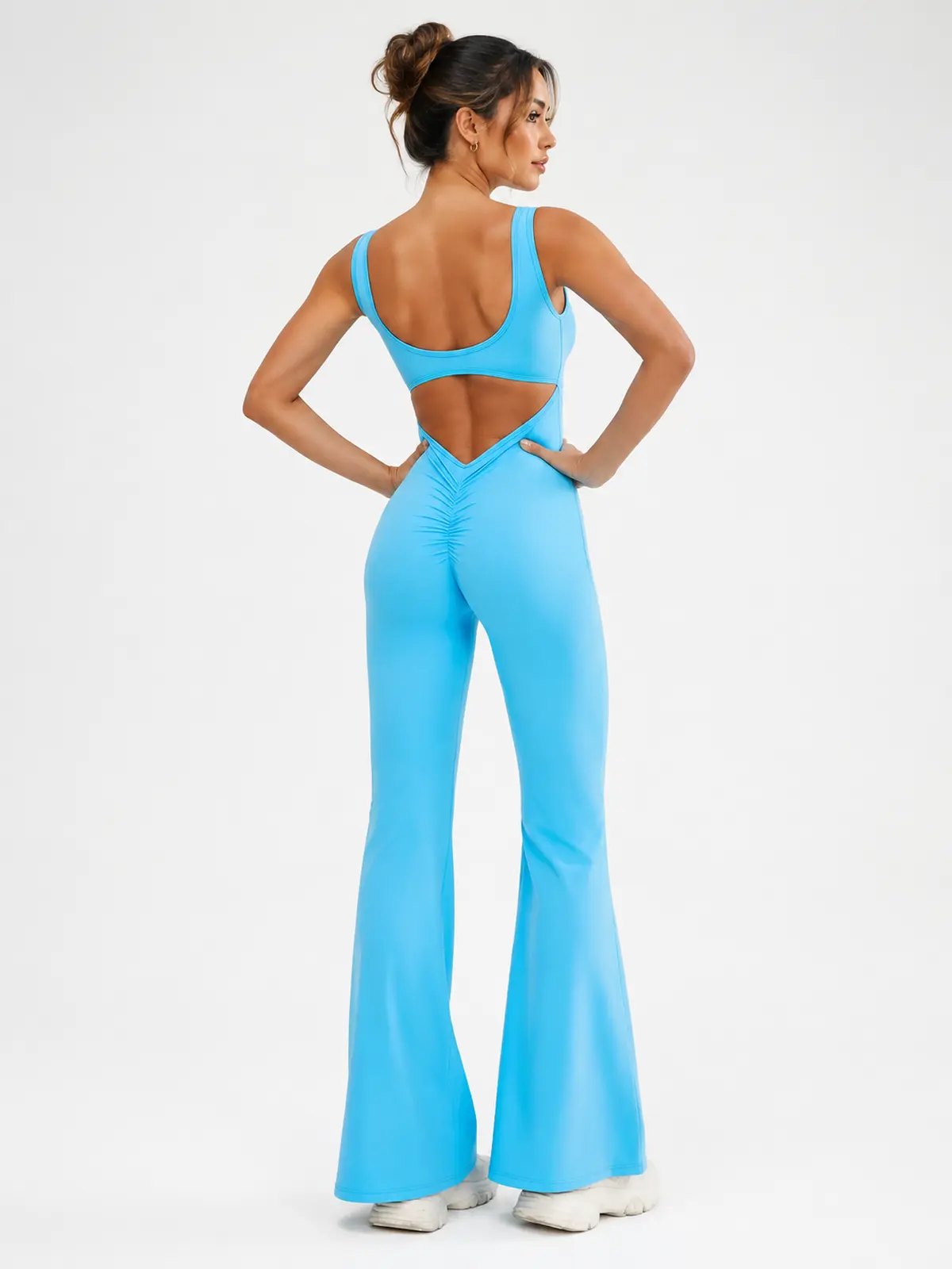 Pavilion Drift Sleeveless Open-Back Flared-Leg Yoga Jumpsuit — bright turquoise blue — authoritative variation image