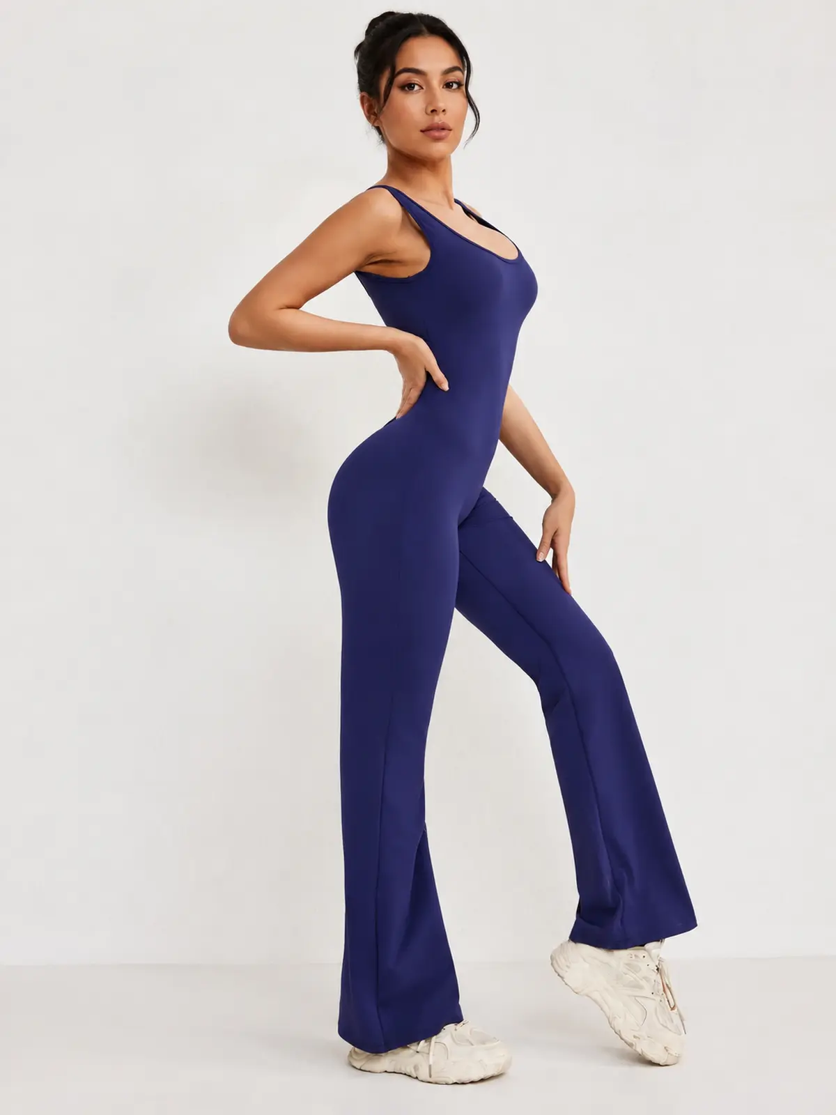 Pavilion Drift Sleeveless Open-Back Flared-Leg Yoga Jumpsuit — navy blue — authoritative variation match