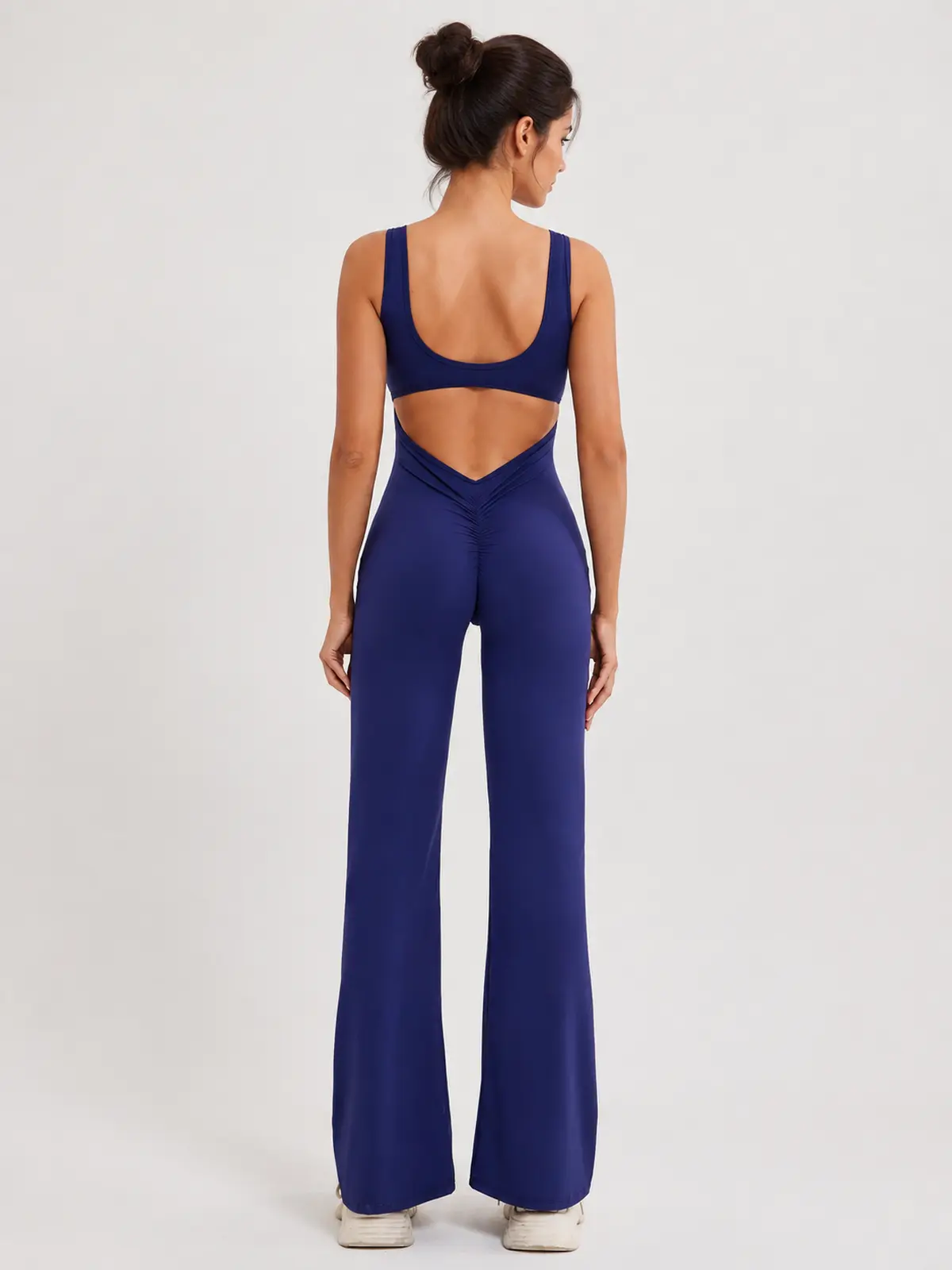 Pavilion Drift Sleeveless Open-Back Flared-Leg Yoga Jumpsuit — navy blue — authoritative variation match